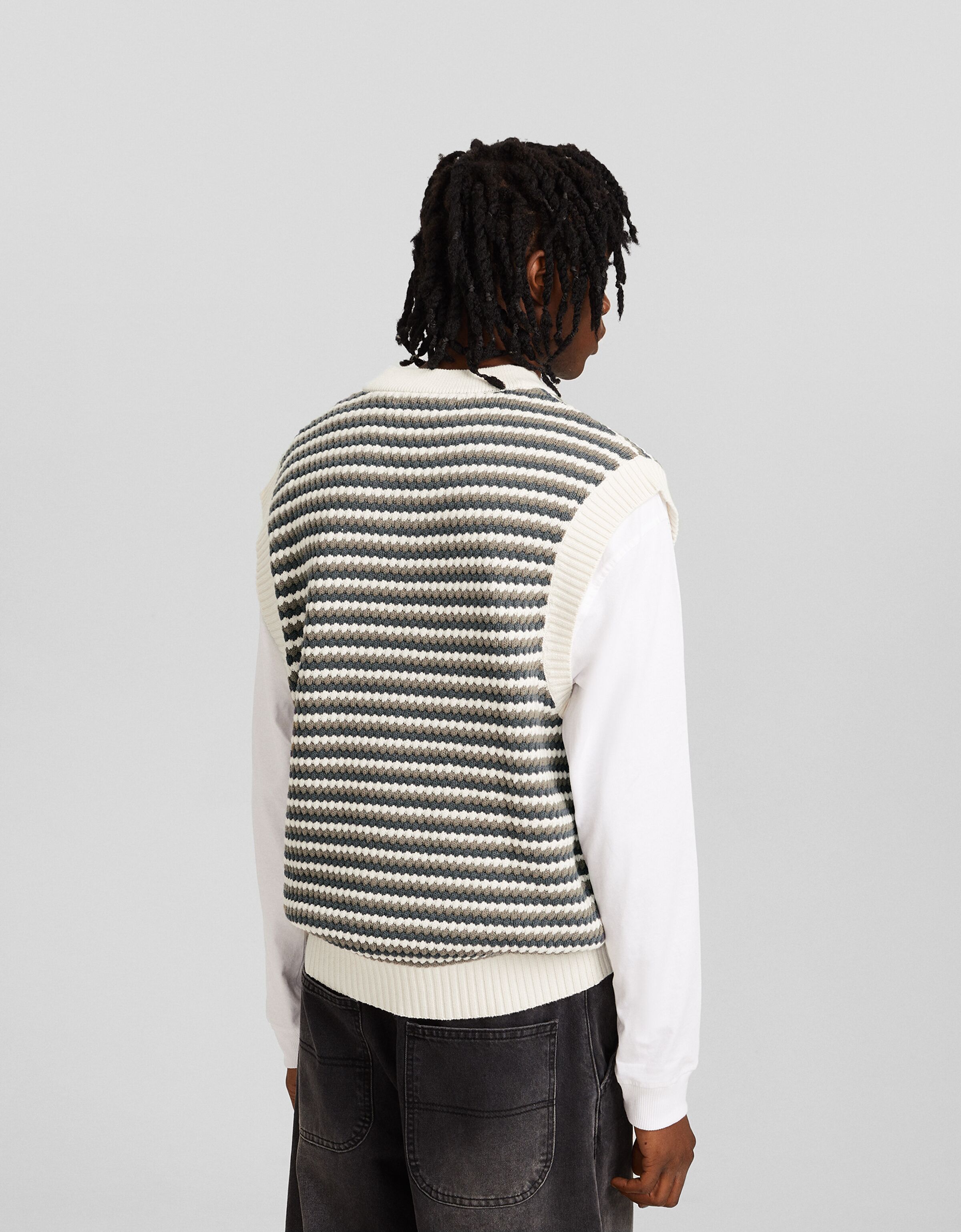 Chaleco cuello pico punto rayas