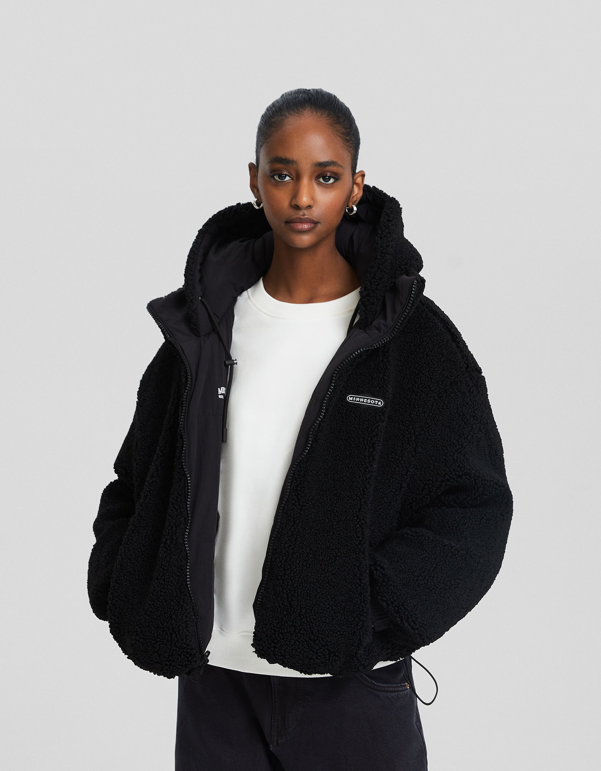 Cazadora capucha reversible borreguillo con nylon