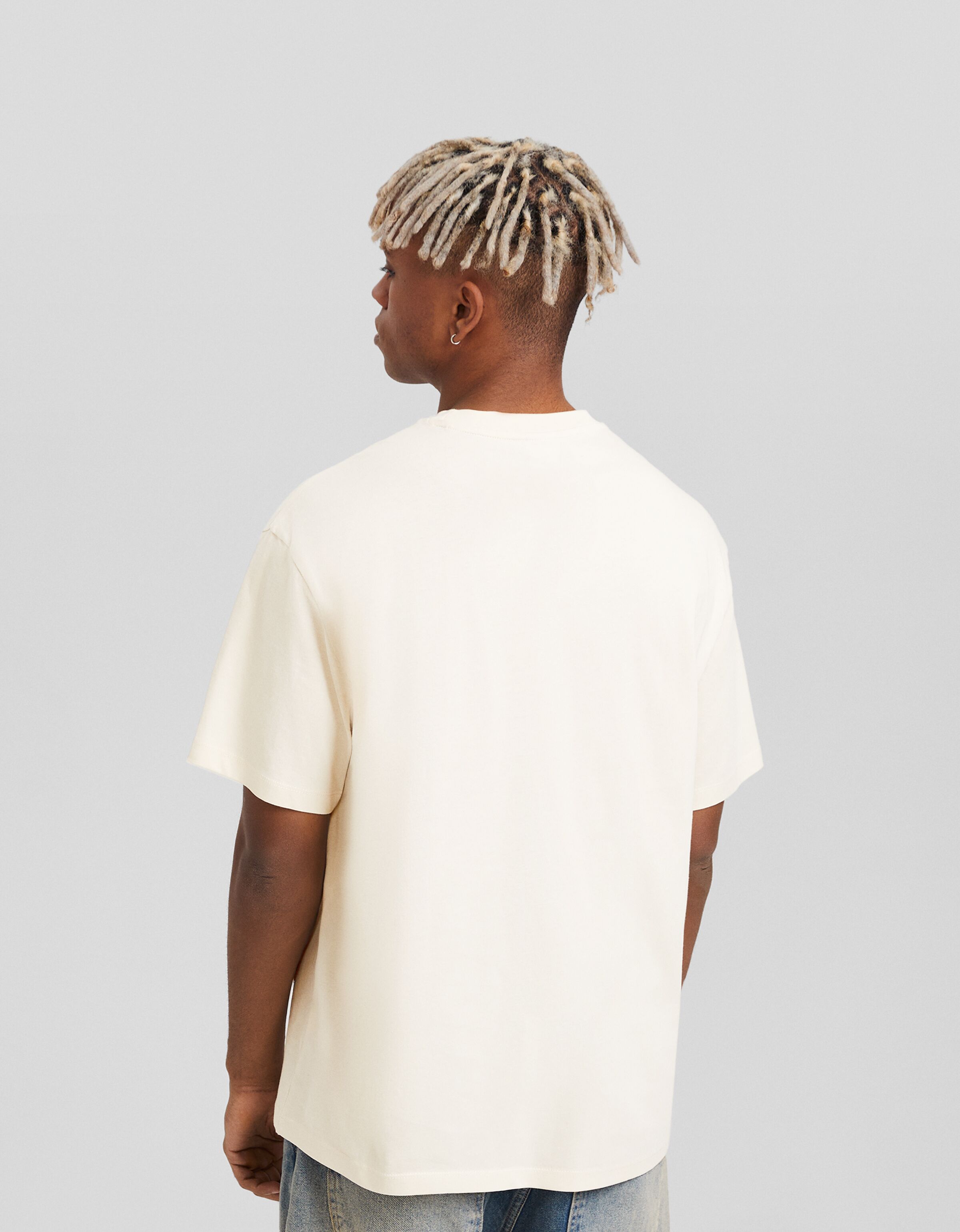 Camiseta manga corta boxy fit print varsity