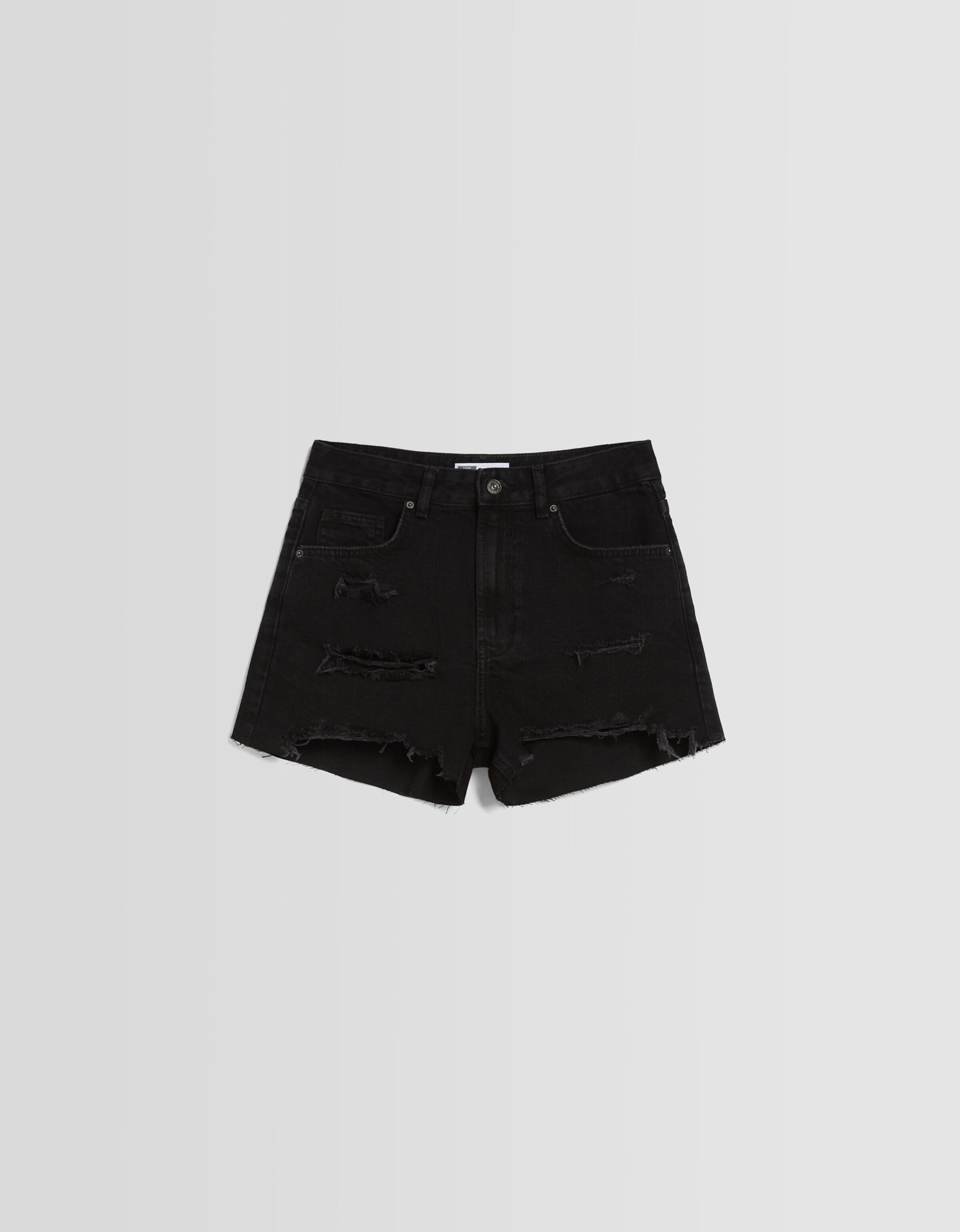 Short denim rotos bolsillos