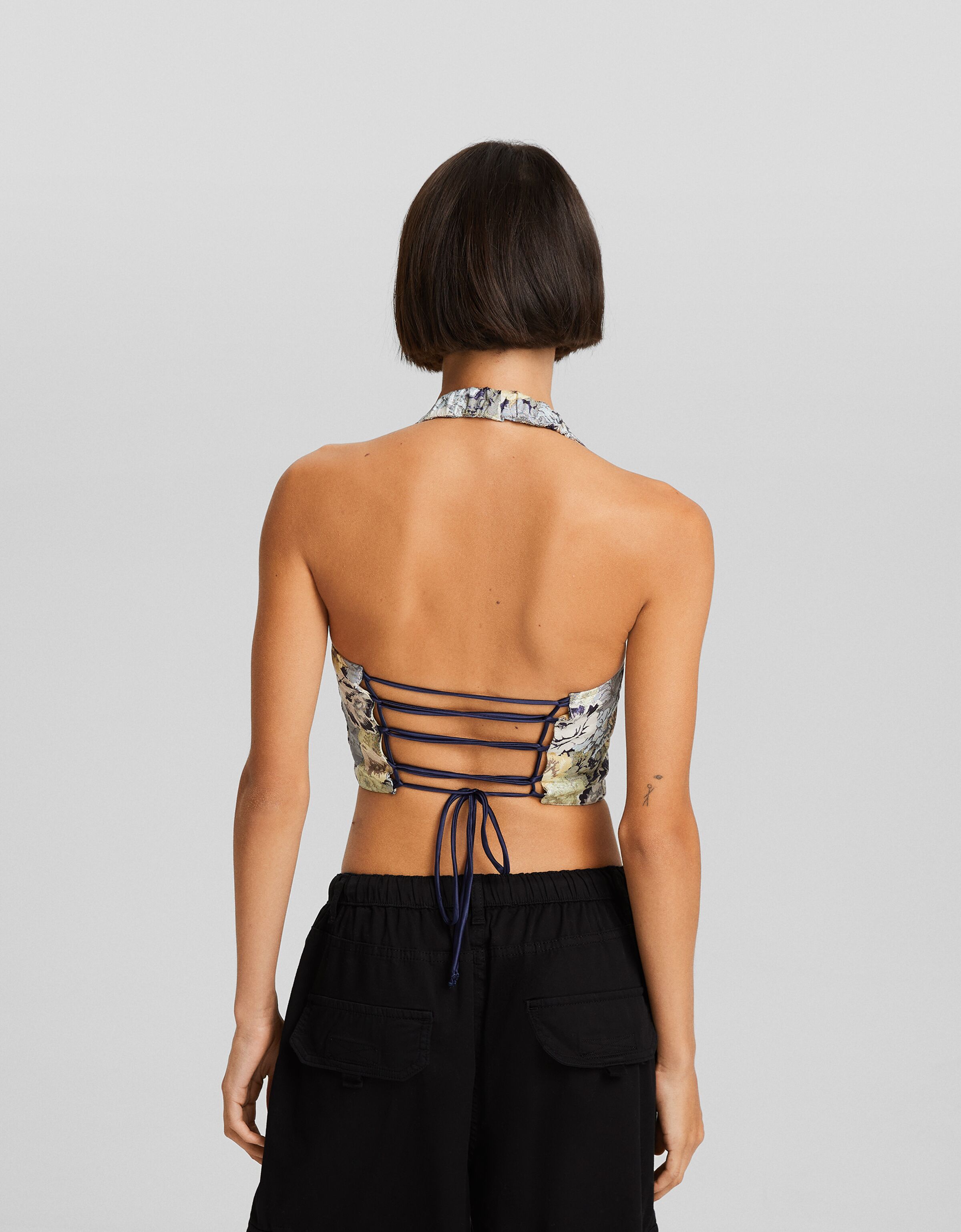 Top espalda descubierta jacquard lazada