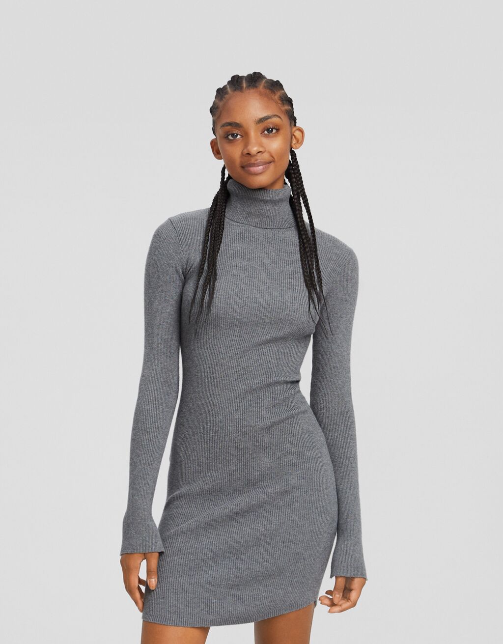 Vestido mini manga larga cuello subido punto