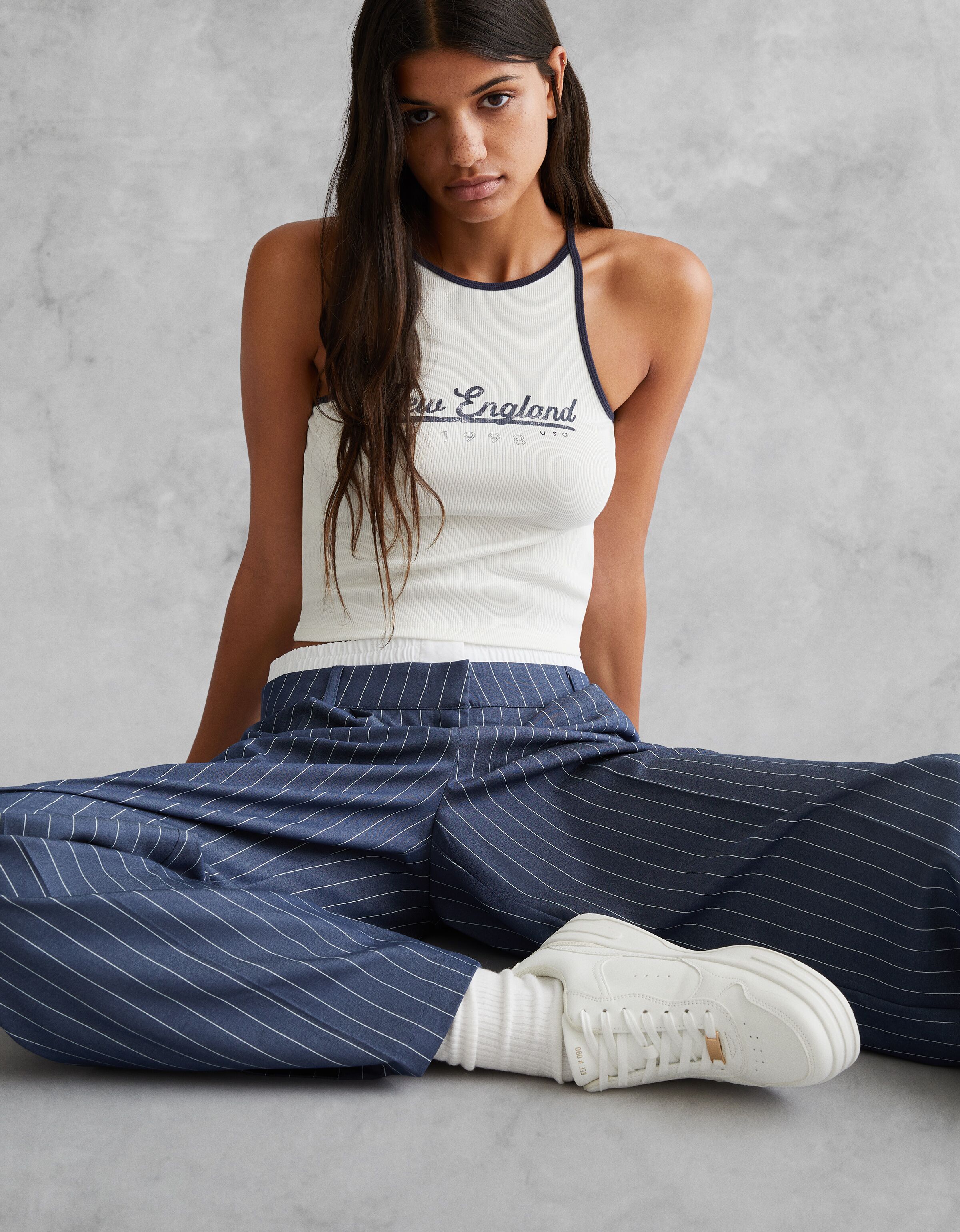 Zapatillas detalle chapa