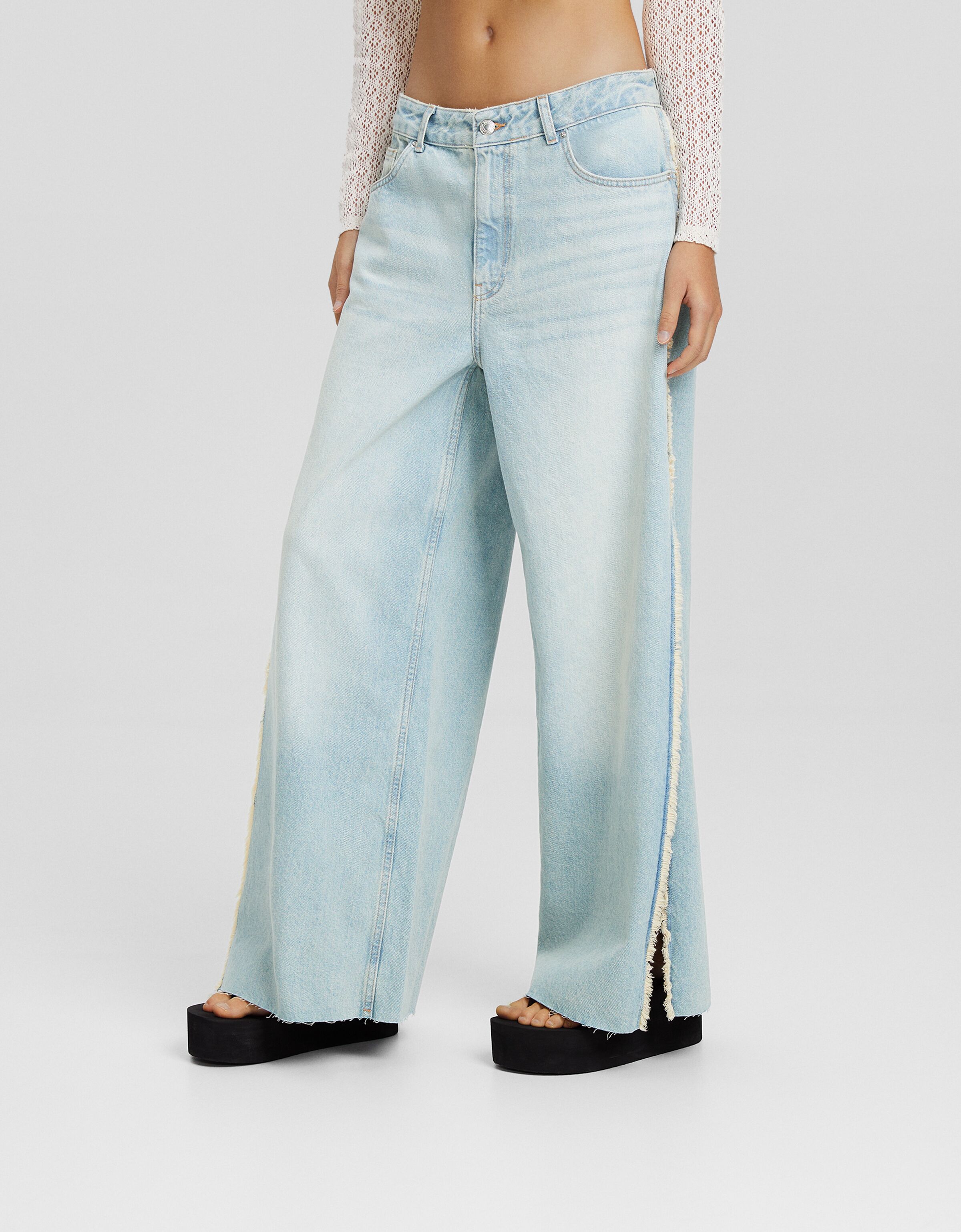 Jeans wide abertura lateral