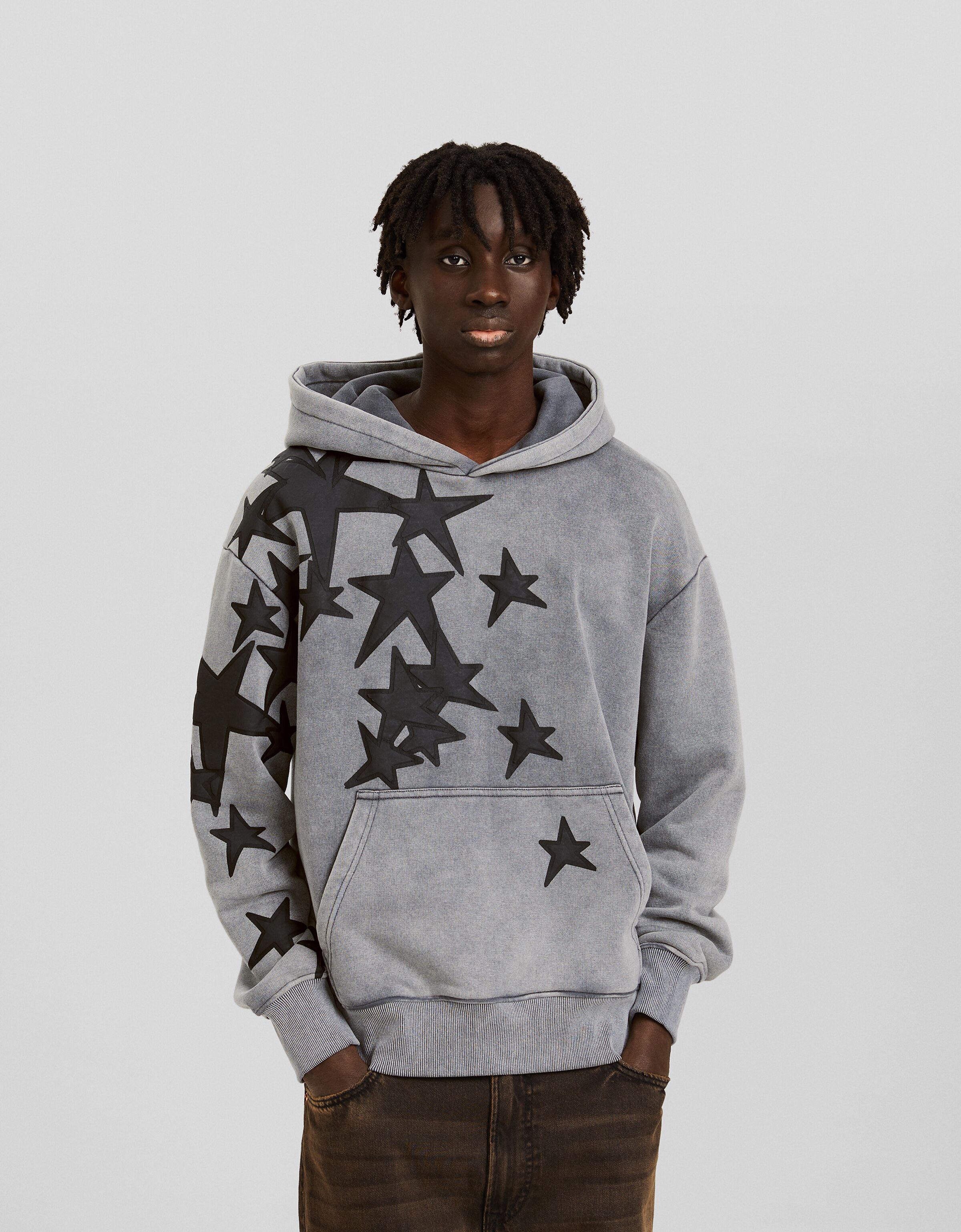 Sudadera efecto lavado parches