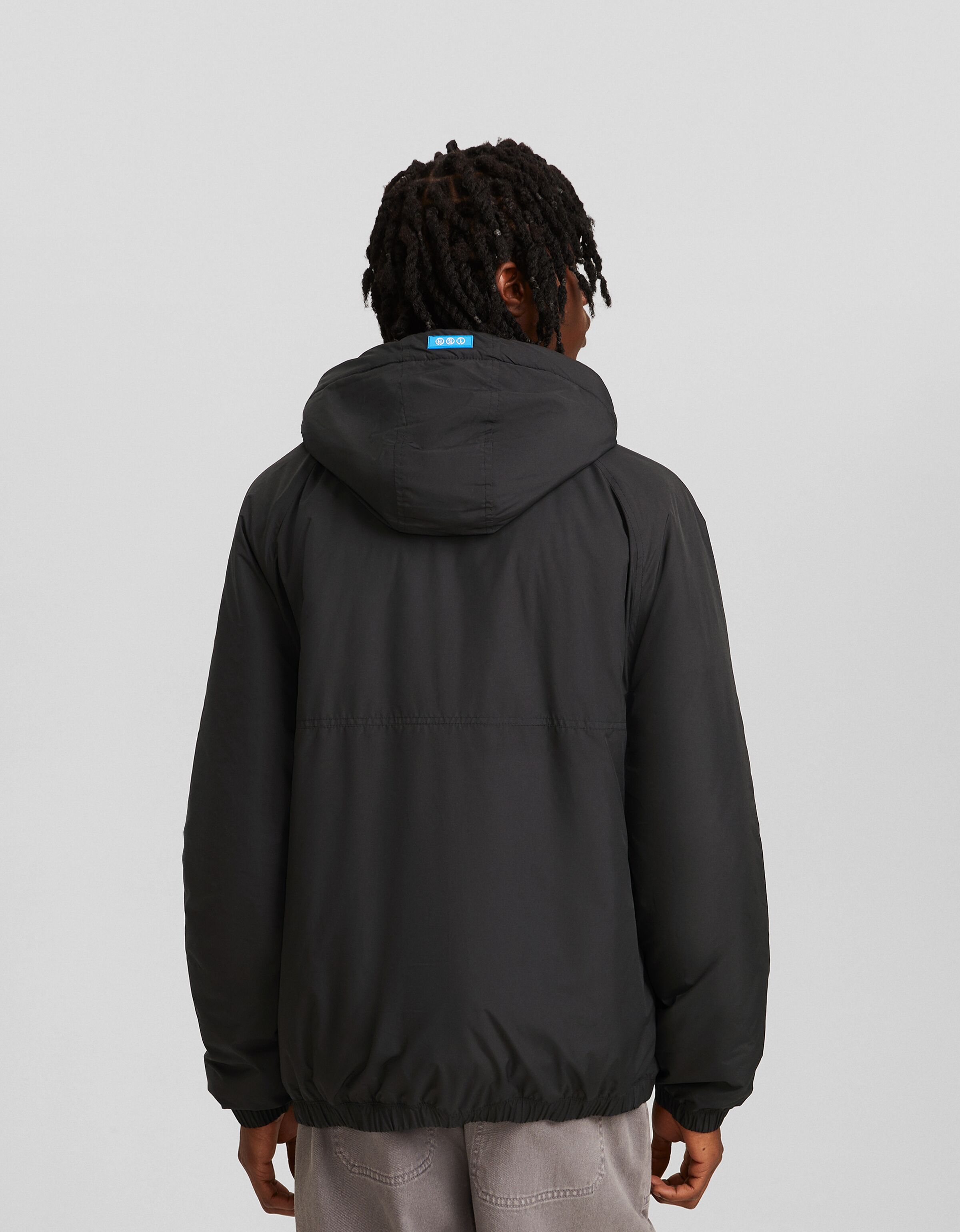 Cazadora canguro capucha acolchada