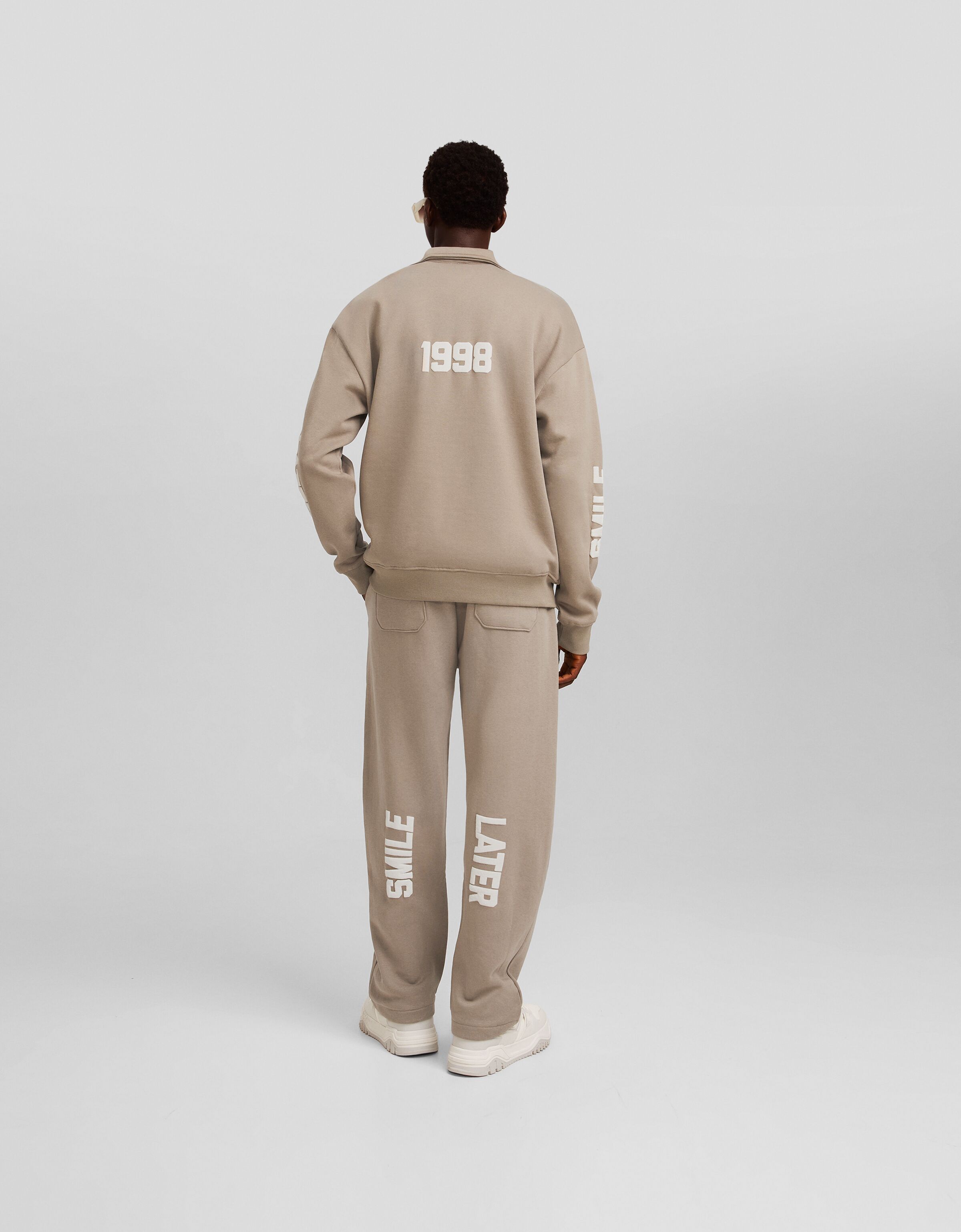 Sudadera cuello polo print