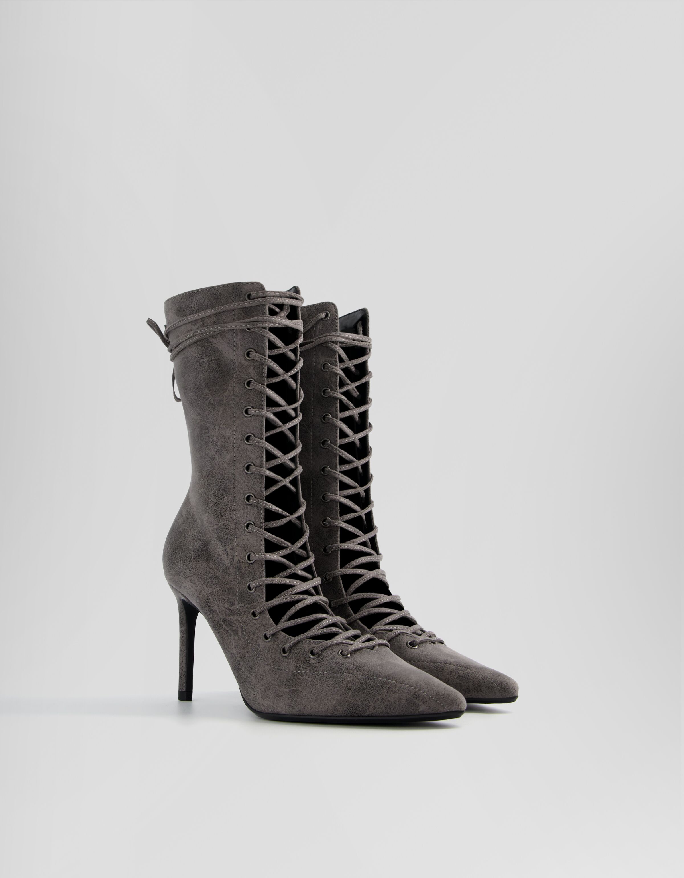 Botines tacón fino acordonados con cremallera