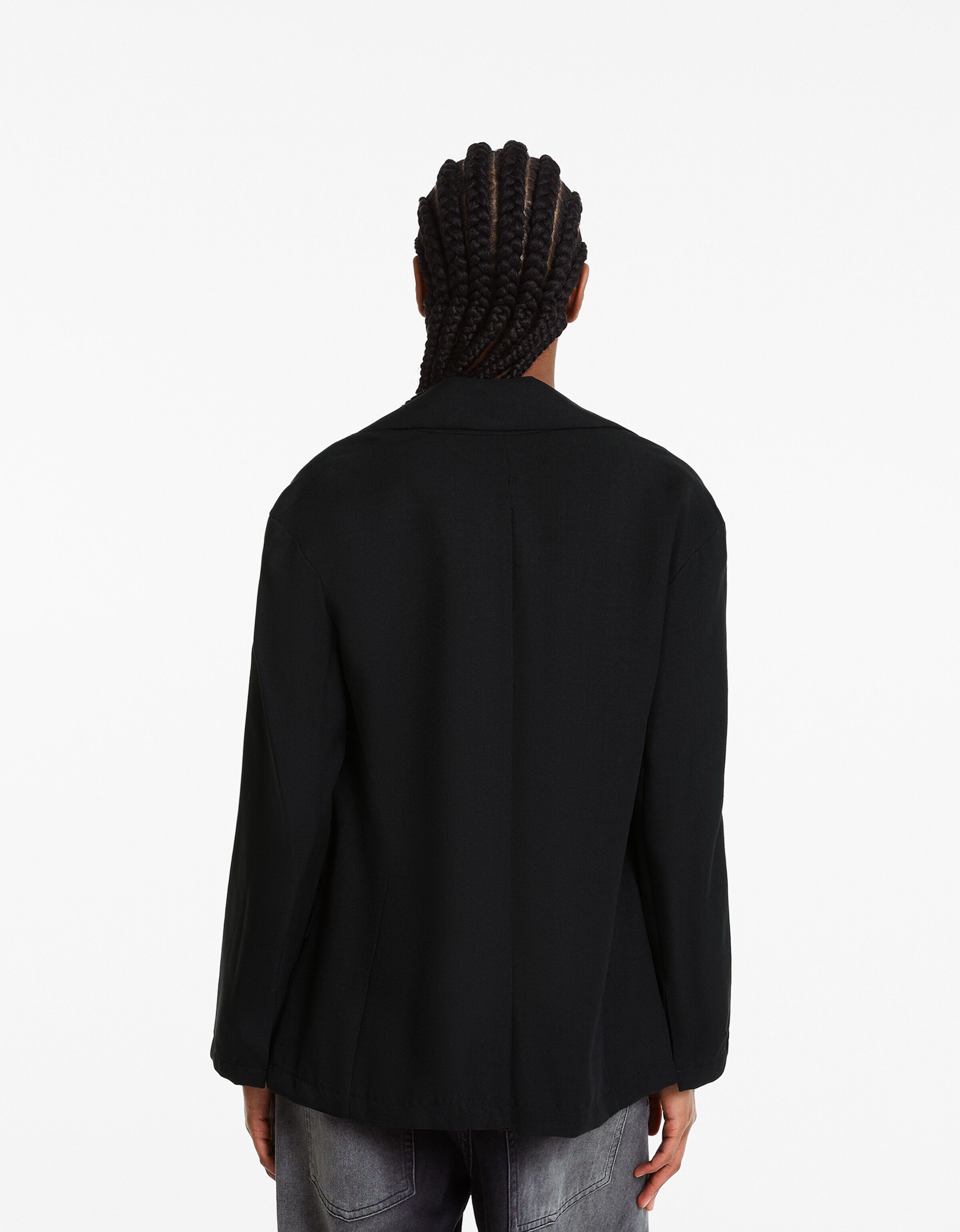 Blazer fluida corte femenino