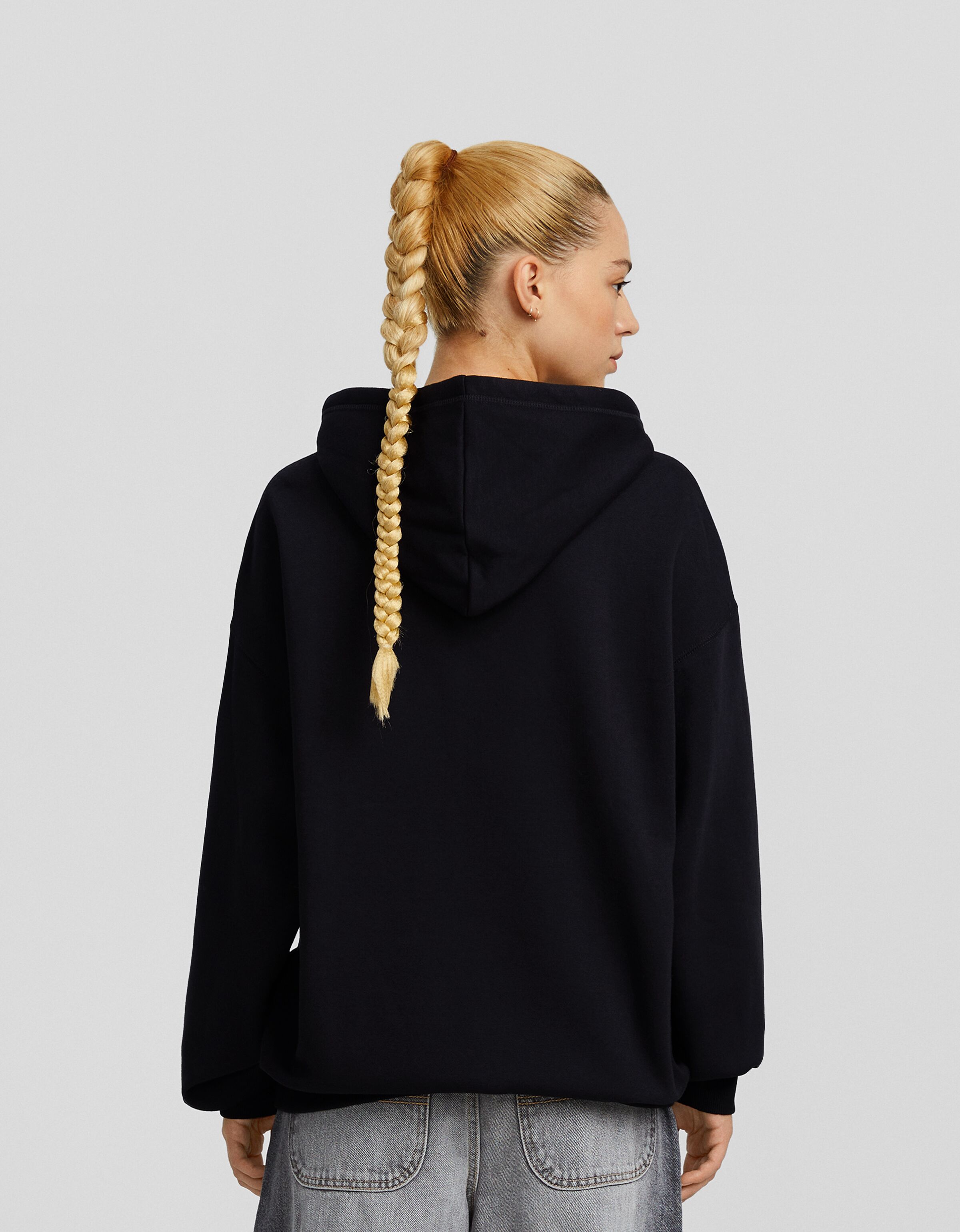 Sudadera capucha oversize bolsillo