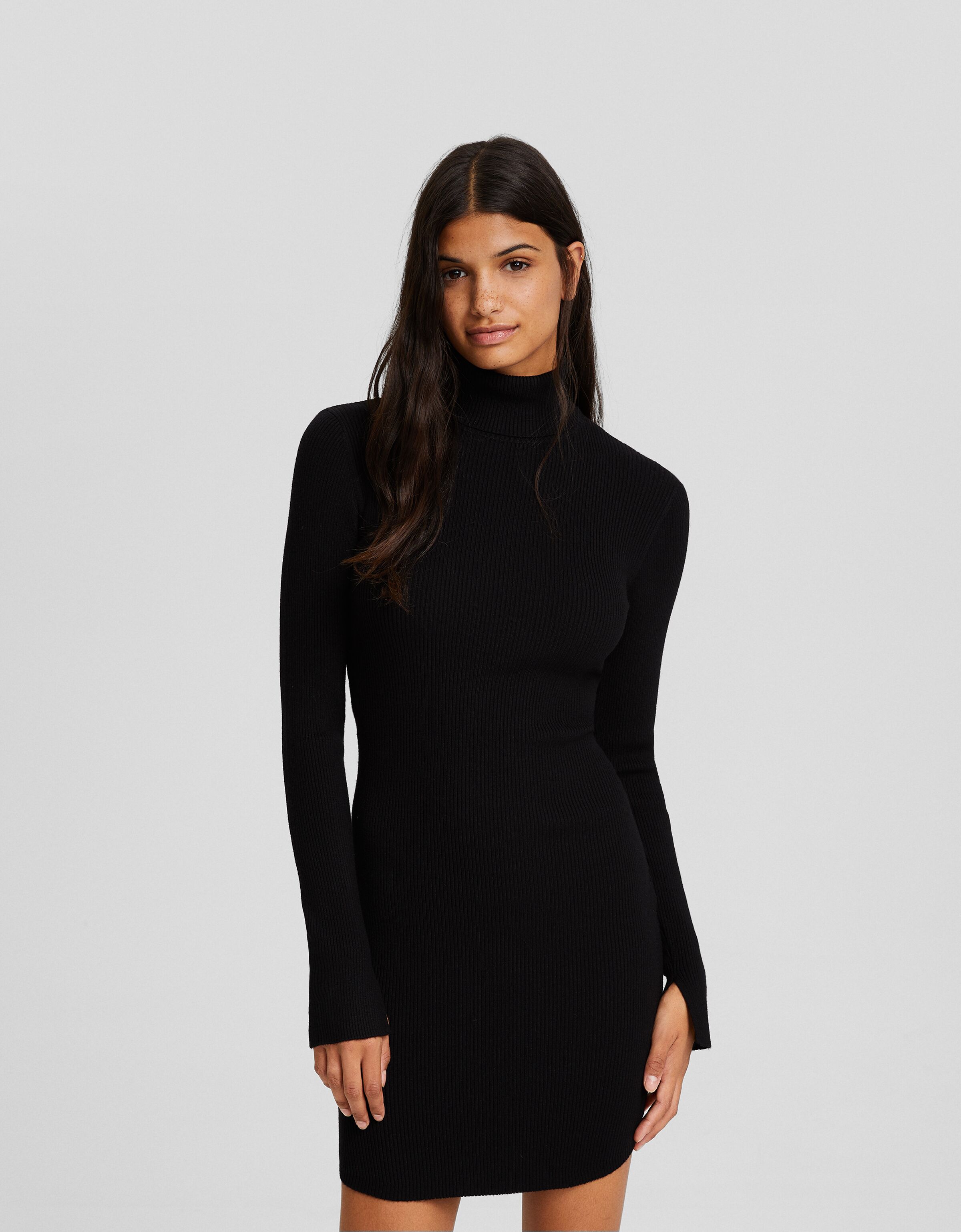 Vestido mini manga larga cuello subido punto