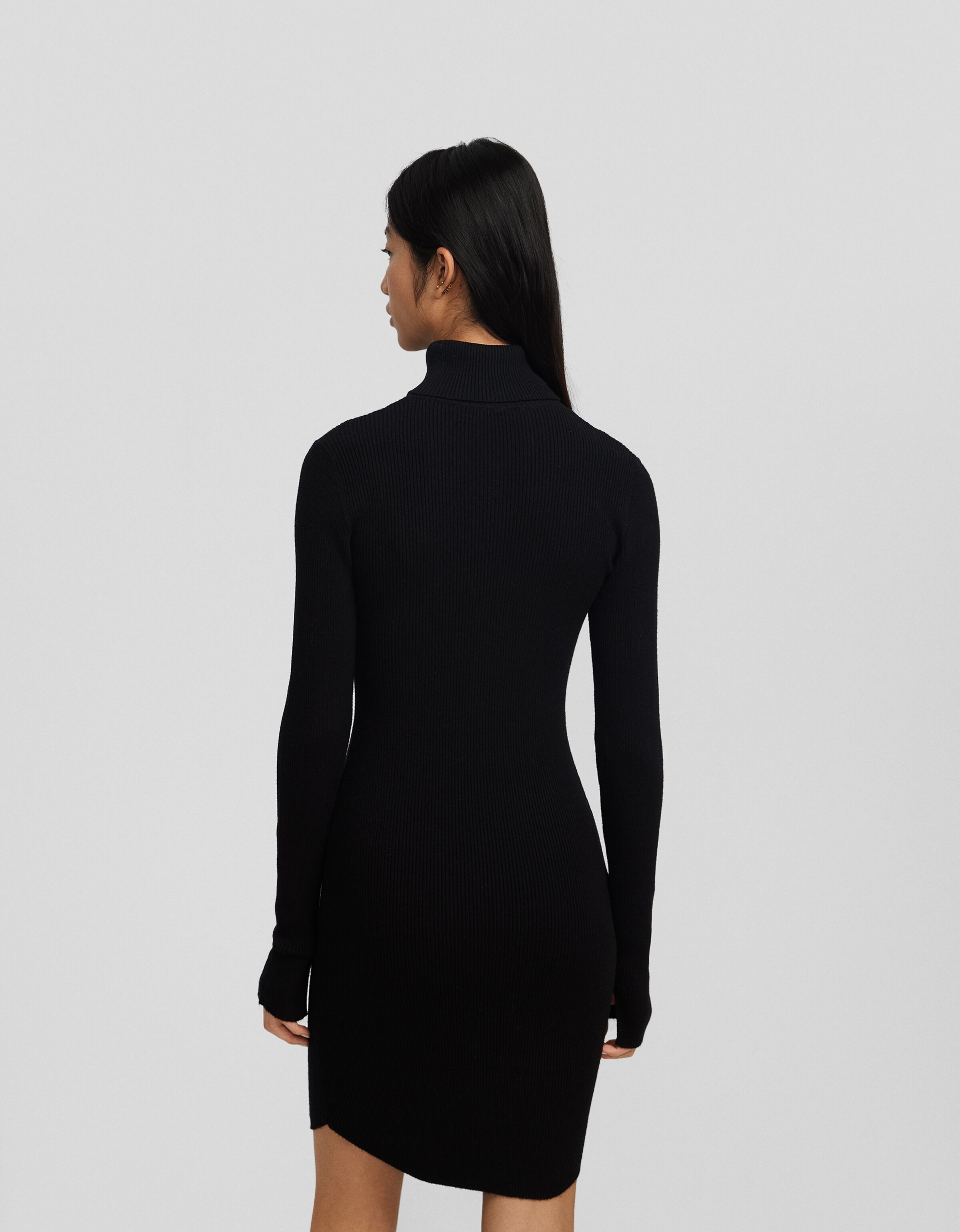 Vestido mini manga larga cuello subido punto