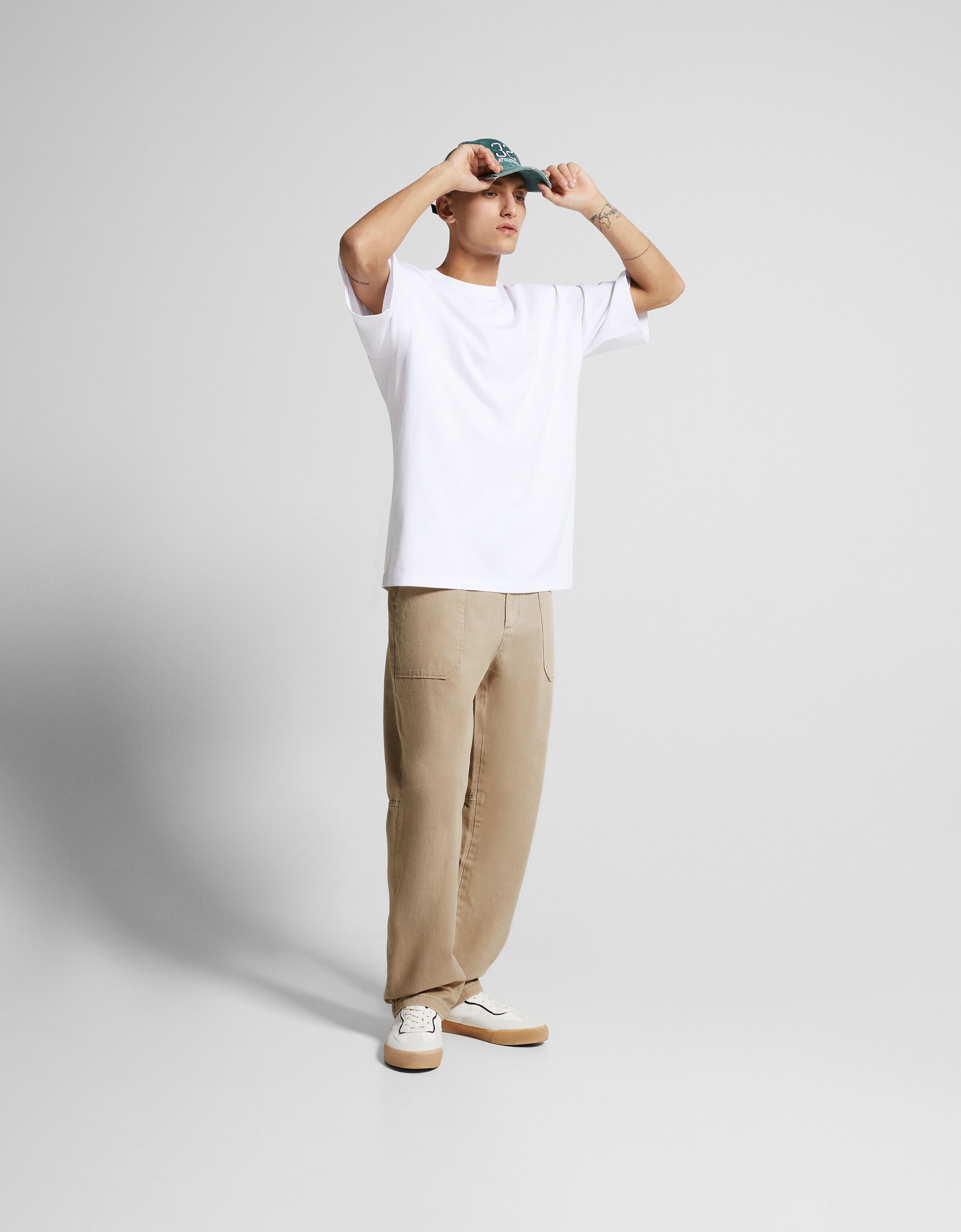 Pantalón algodón detalle bolsillo frontal