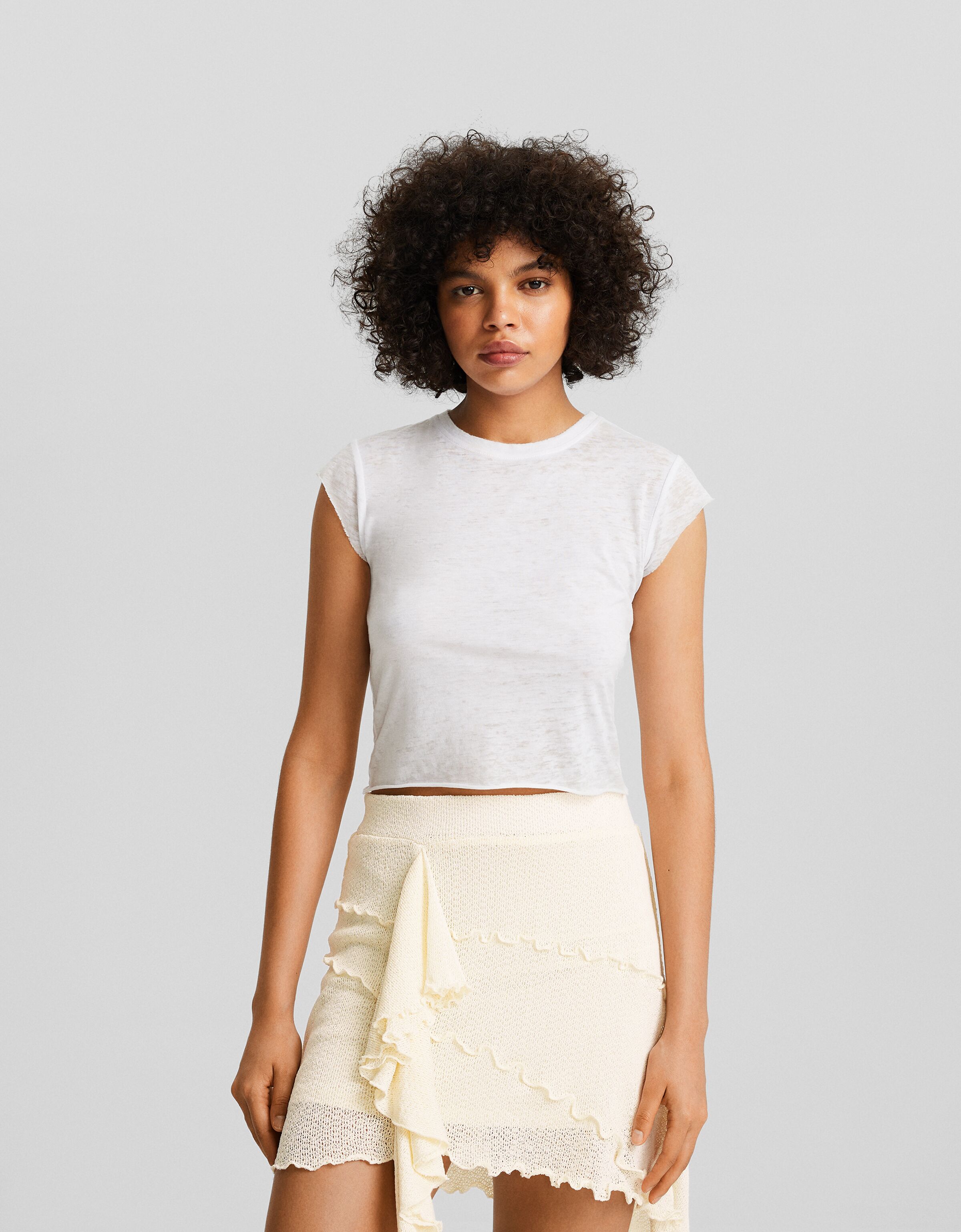 Falda mini punto asimétrica