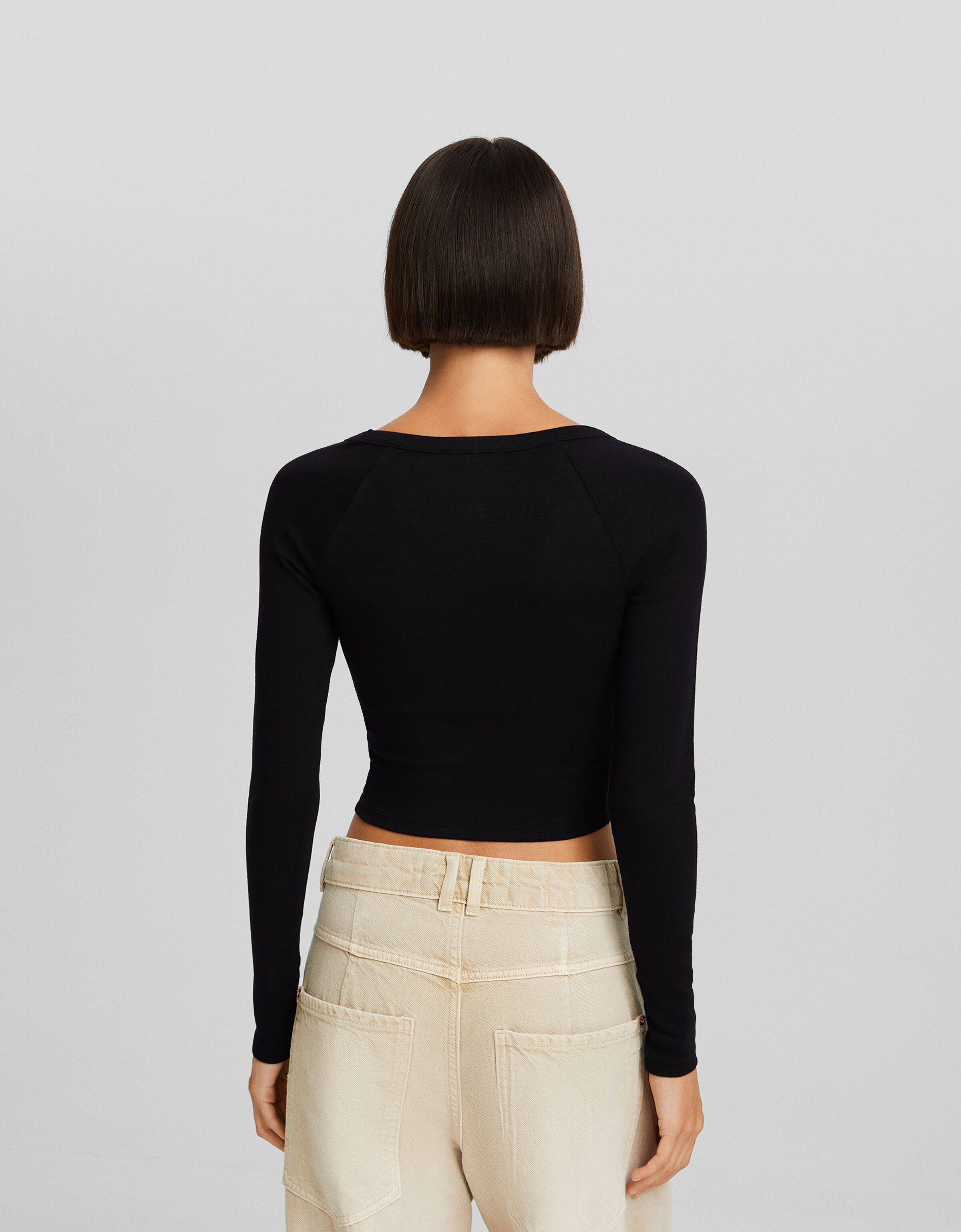 Camiseta manga larga cuello pico