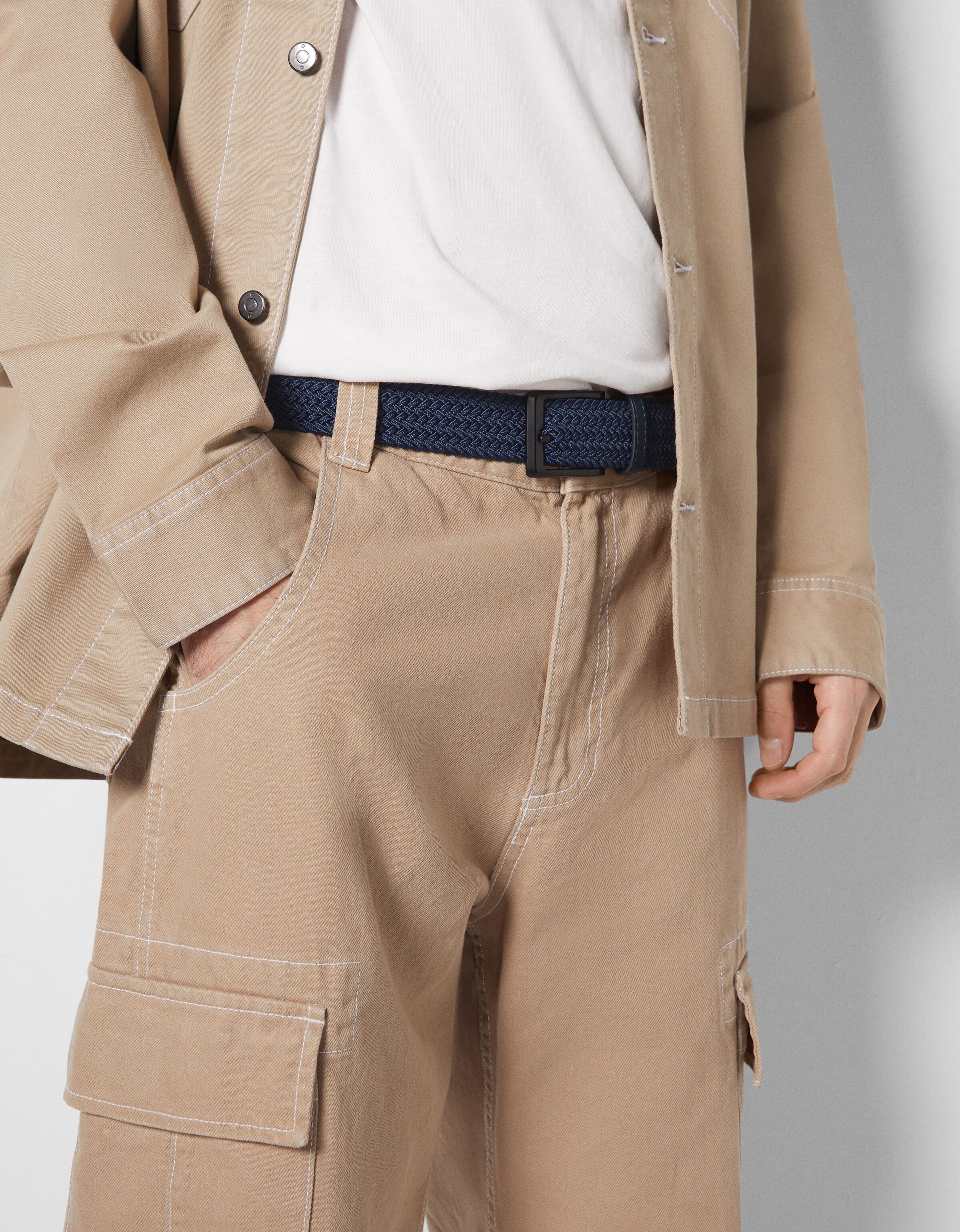 Cinturón trenzado detalle efecto piel