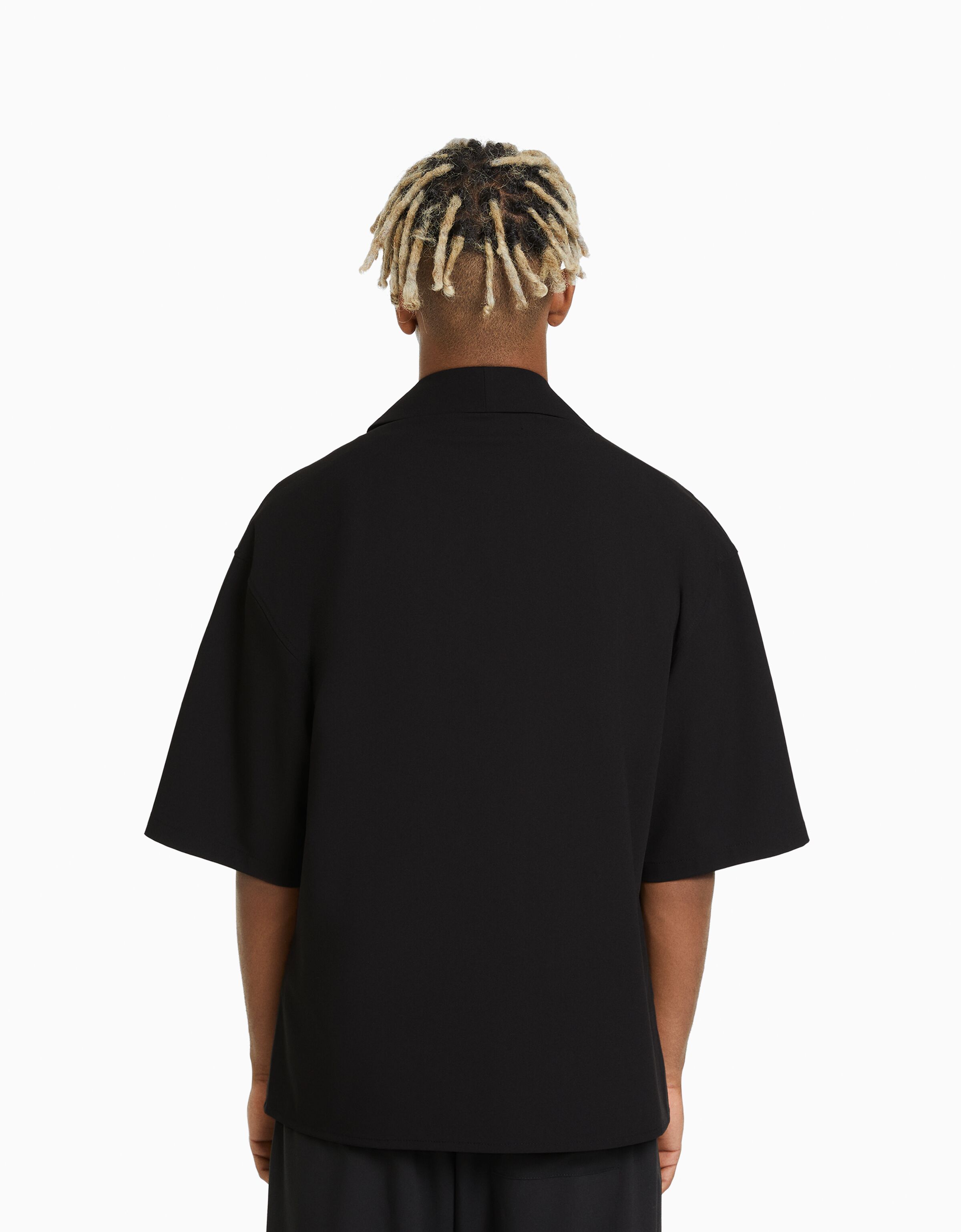 Camisa manga corta solapas