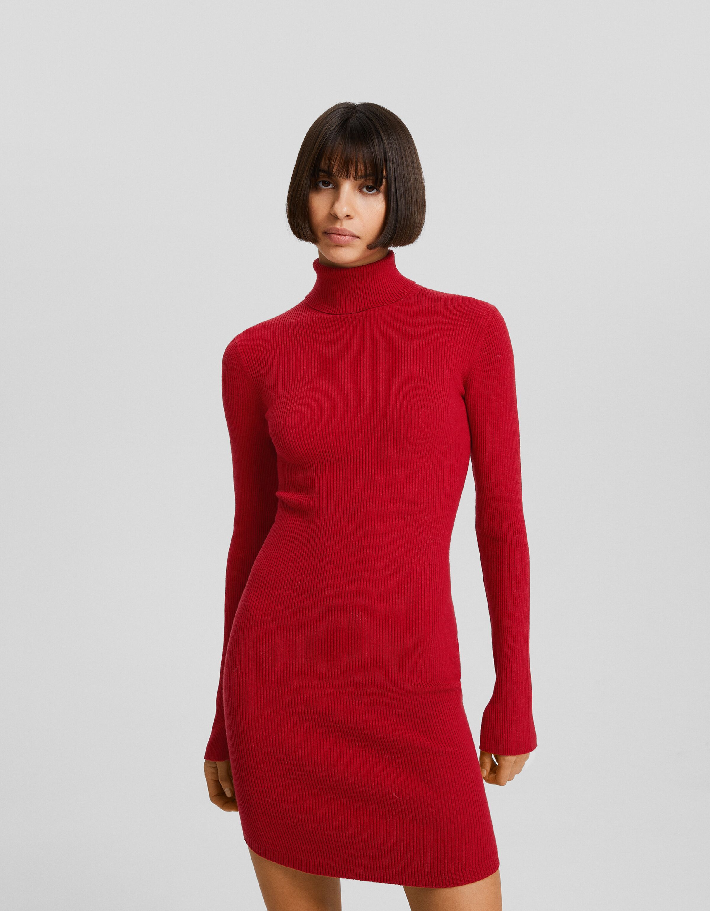 Vestido mini manga larga cuello subido punto