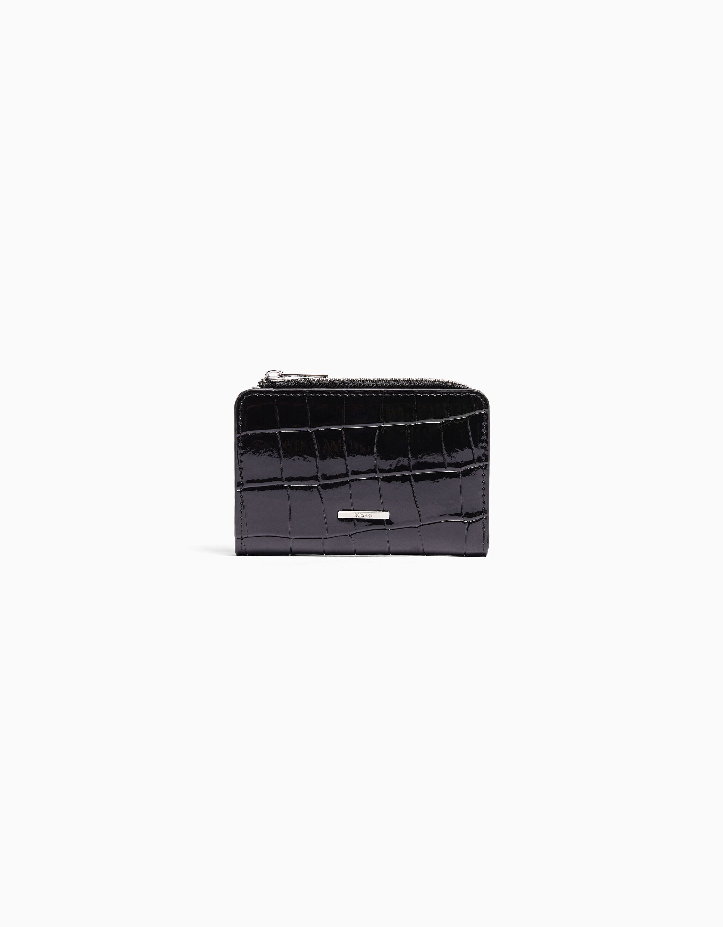 Monedero efecto charol grabado estampado animal