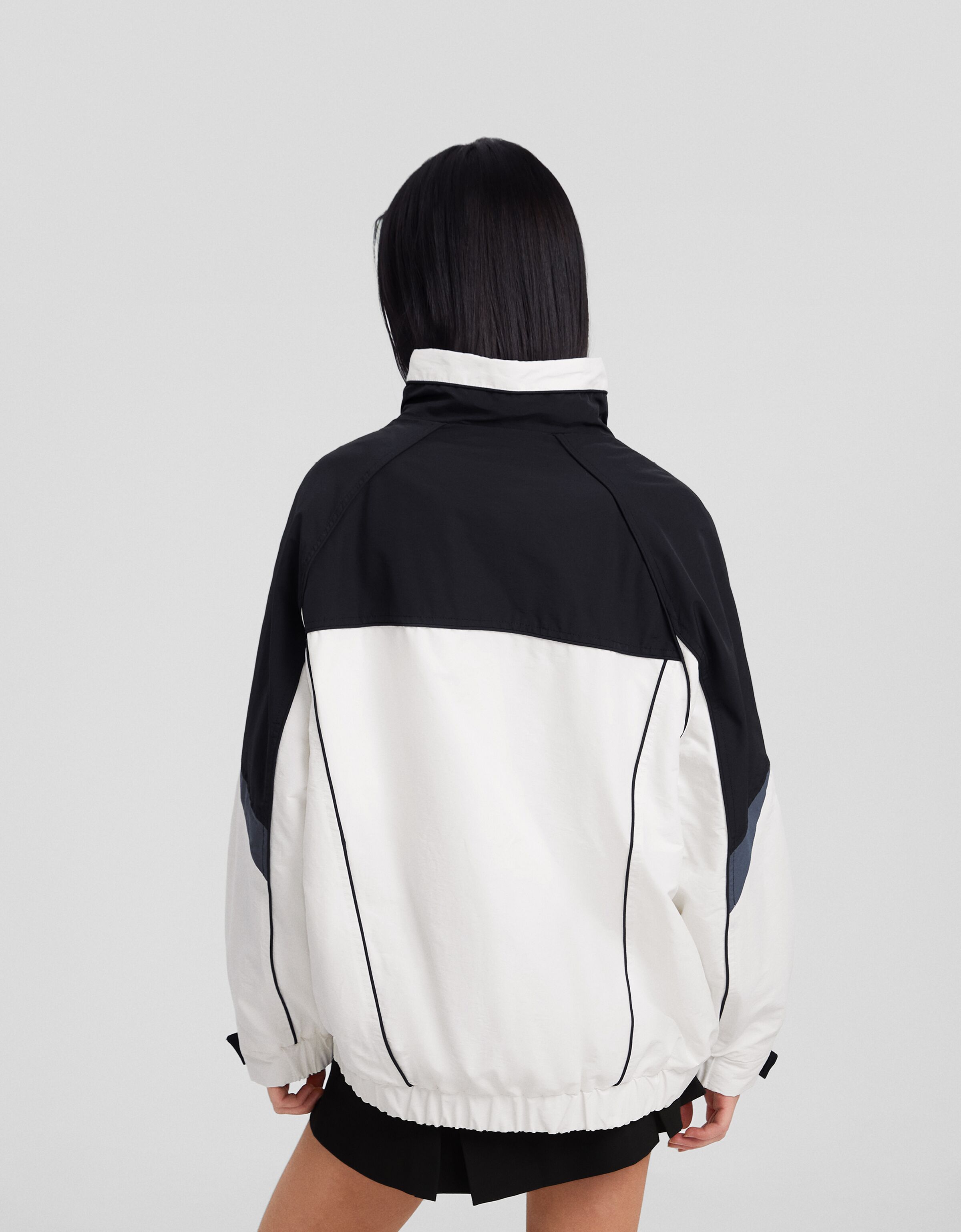 Abrigo con nylon color block