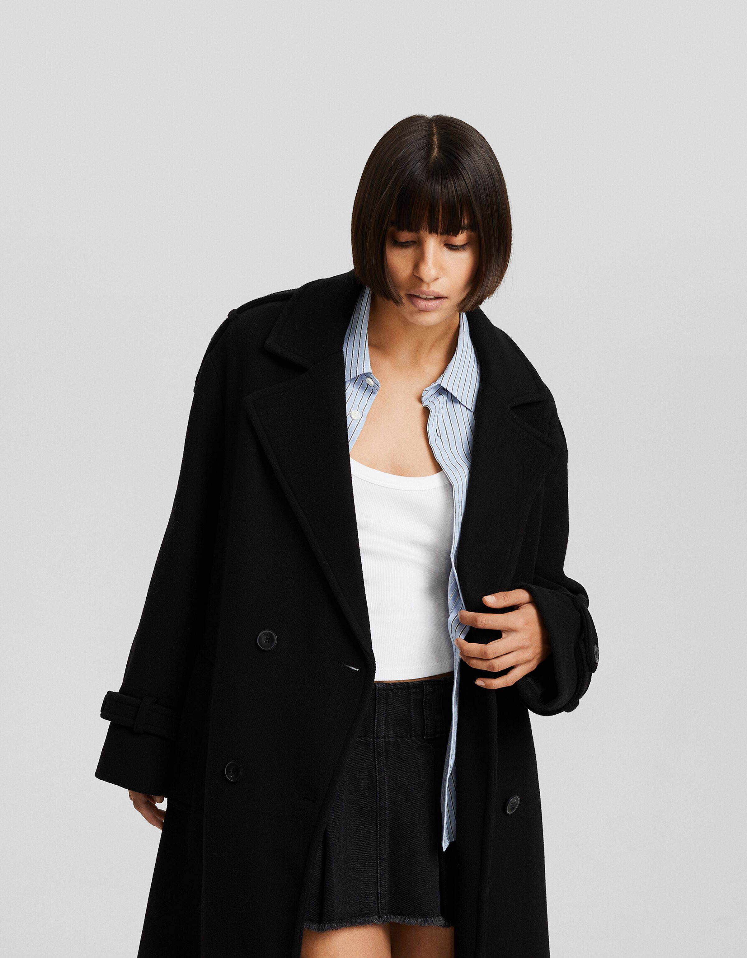 Abrigo trench con lana