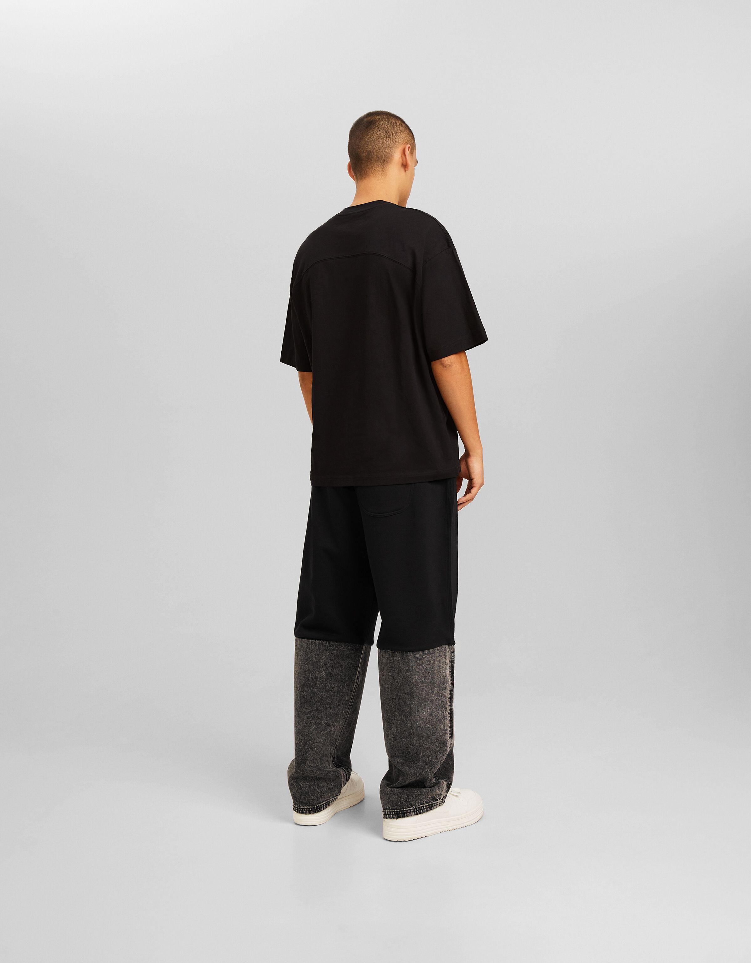 Pantalón baggy detalle felpa denim