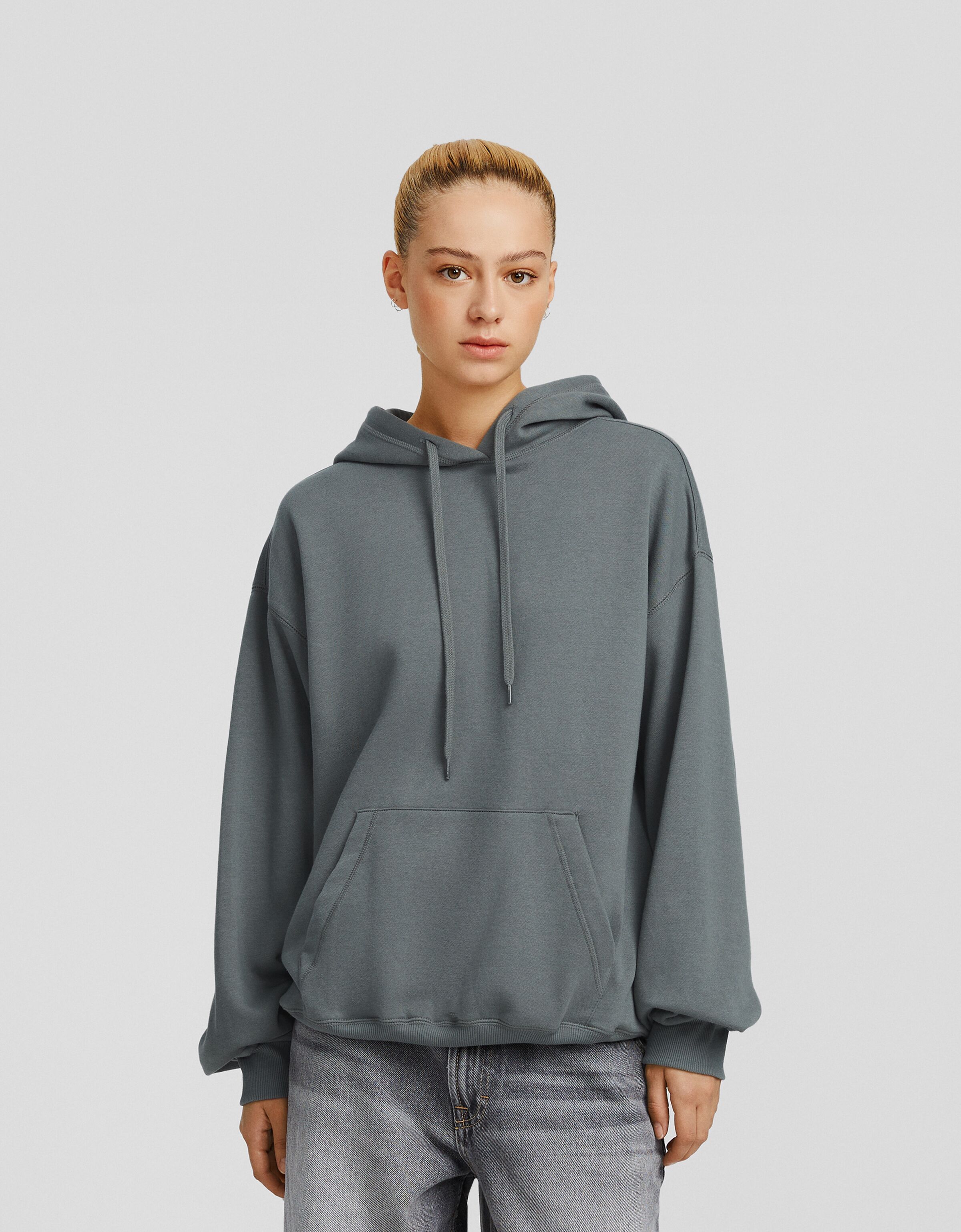 Sudadera capucha oversize bolsillo