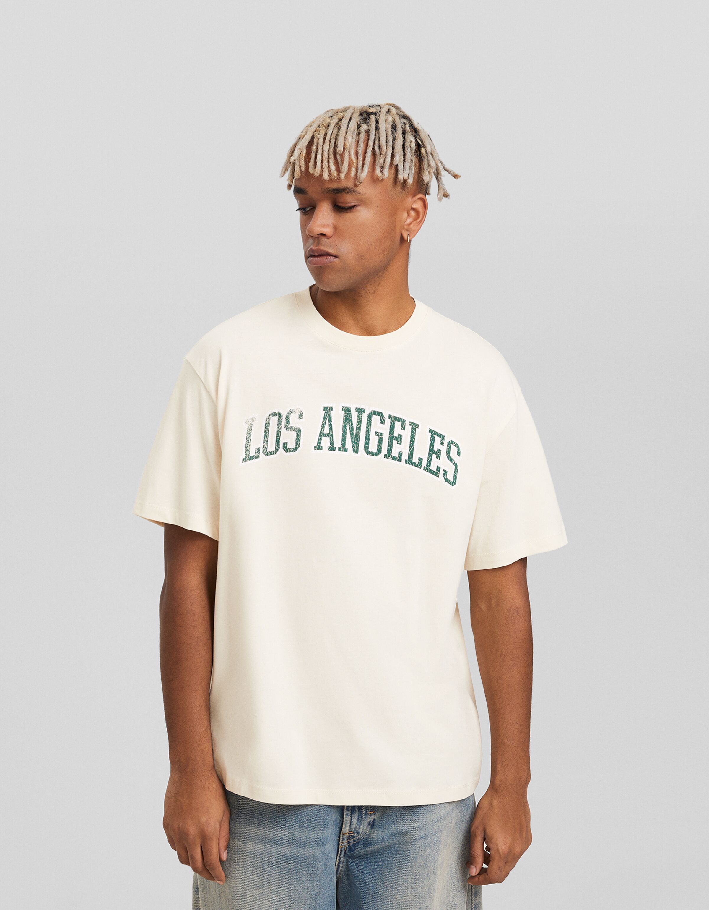 Camiseta manga corta boxy fit print varsity