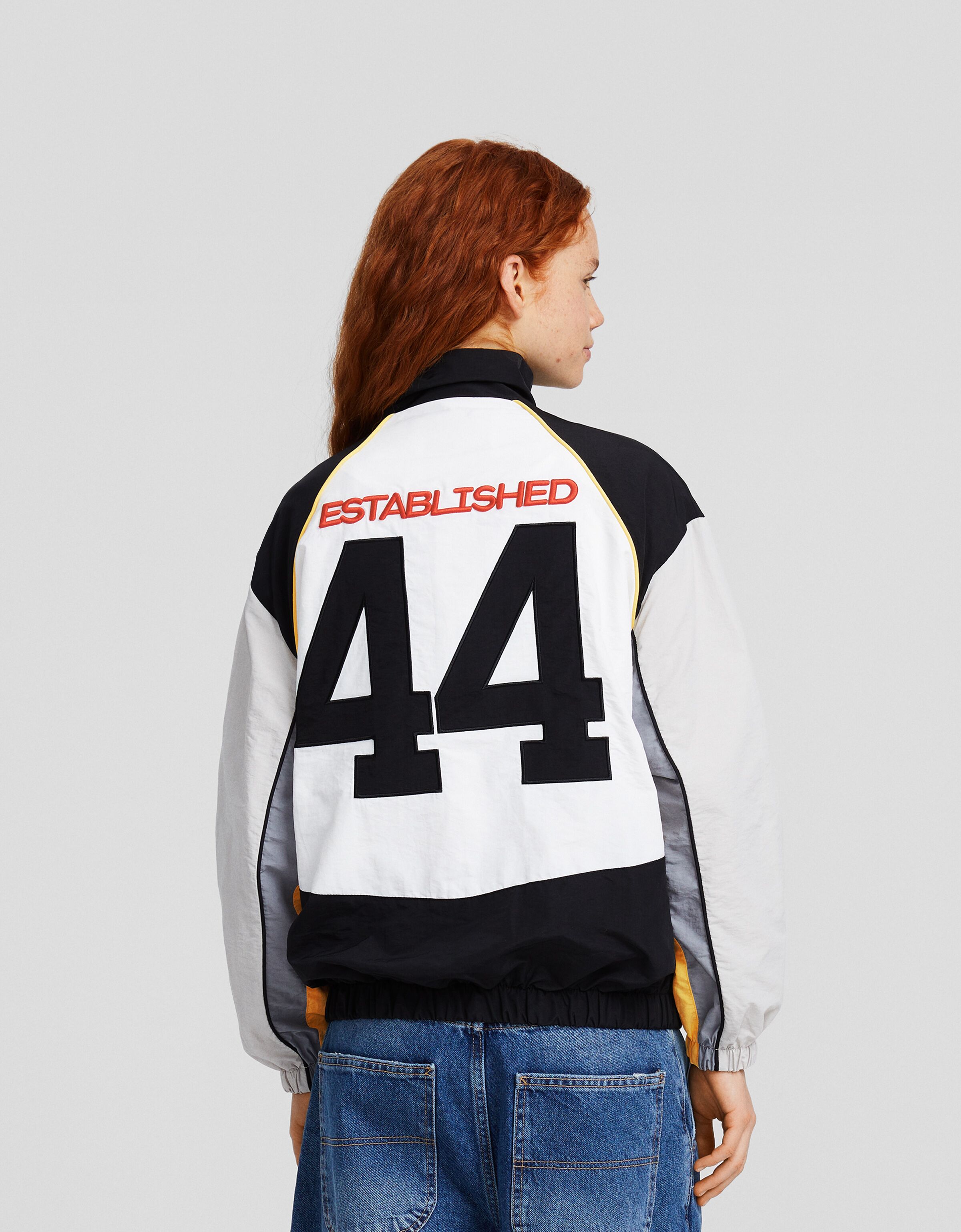 Cazadora con nylon racing