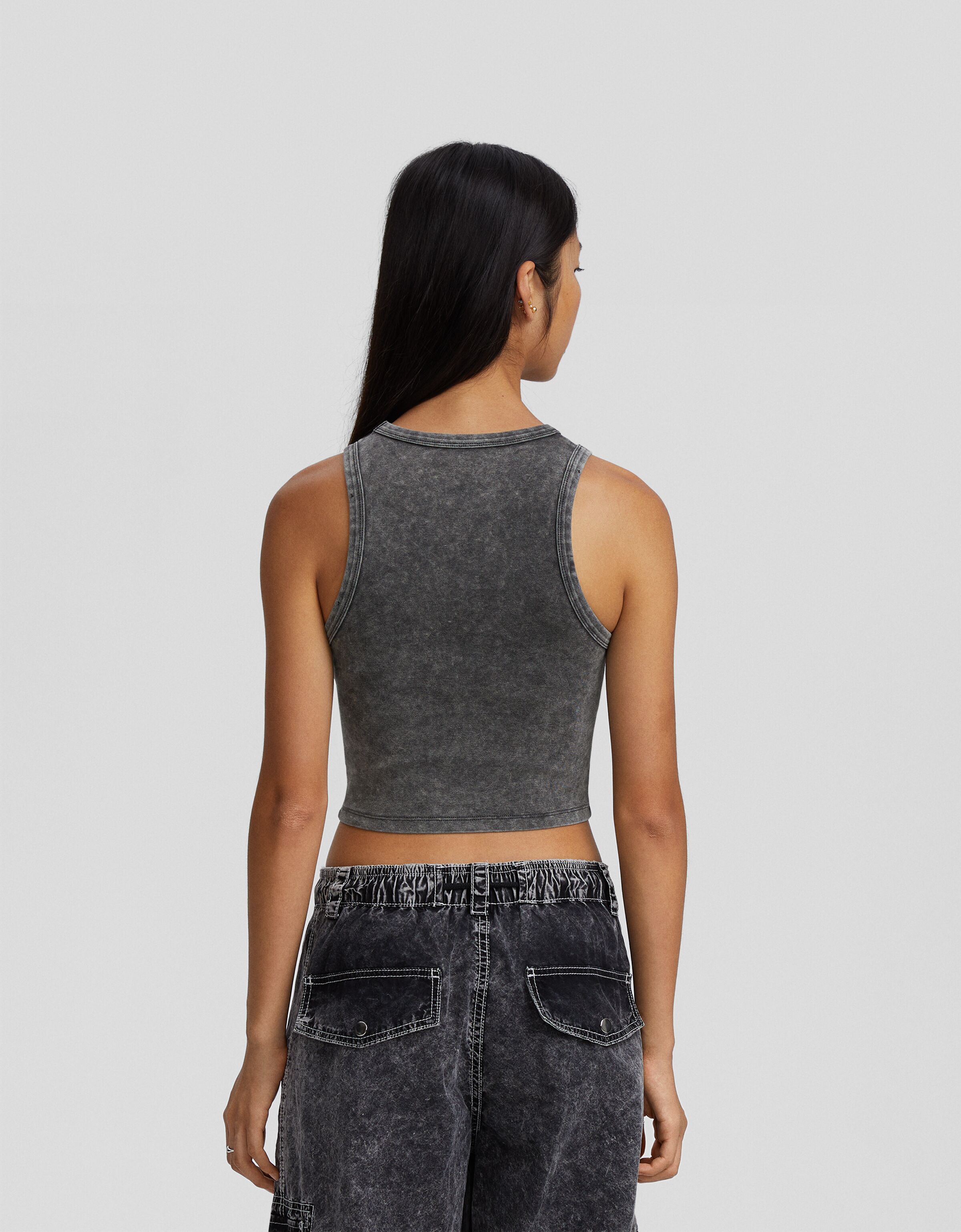 Camiseta sin mangas efecto lavado rotos