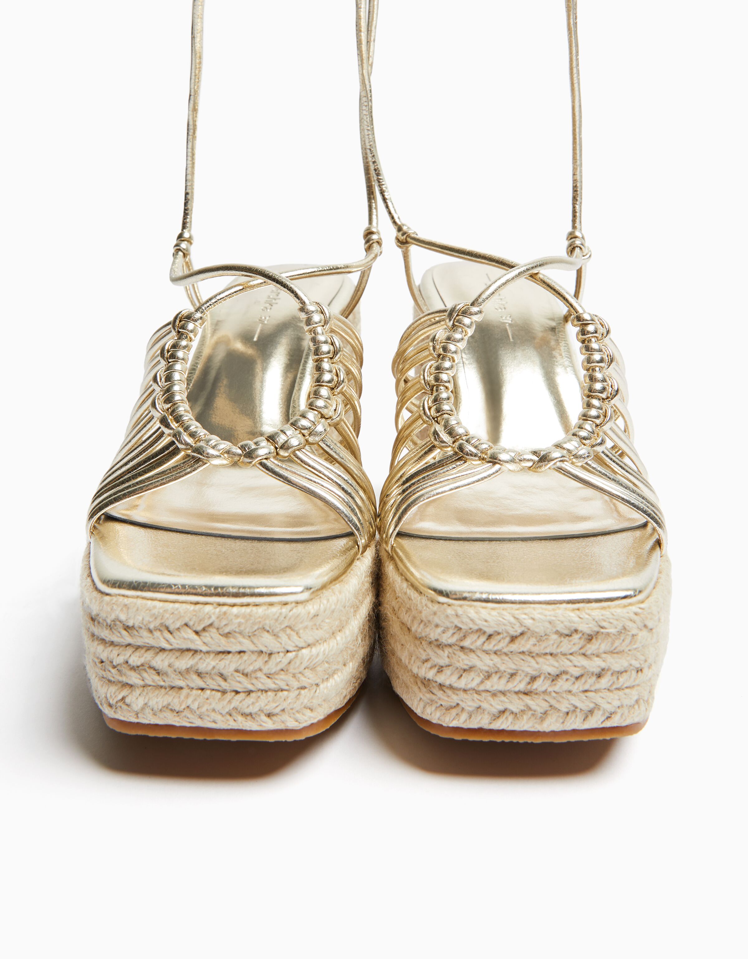 Cua yute tiras atada