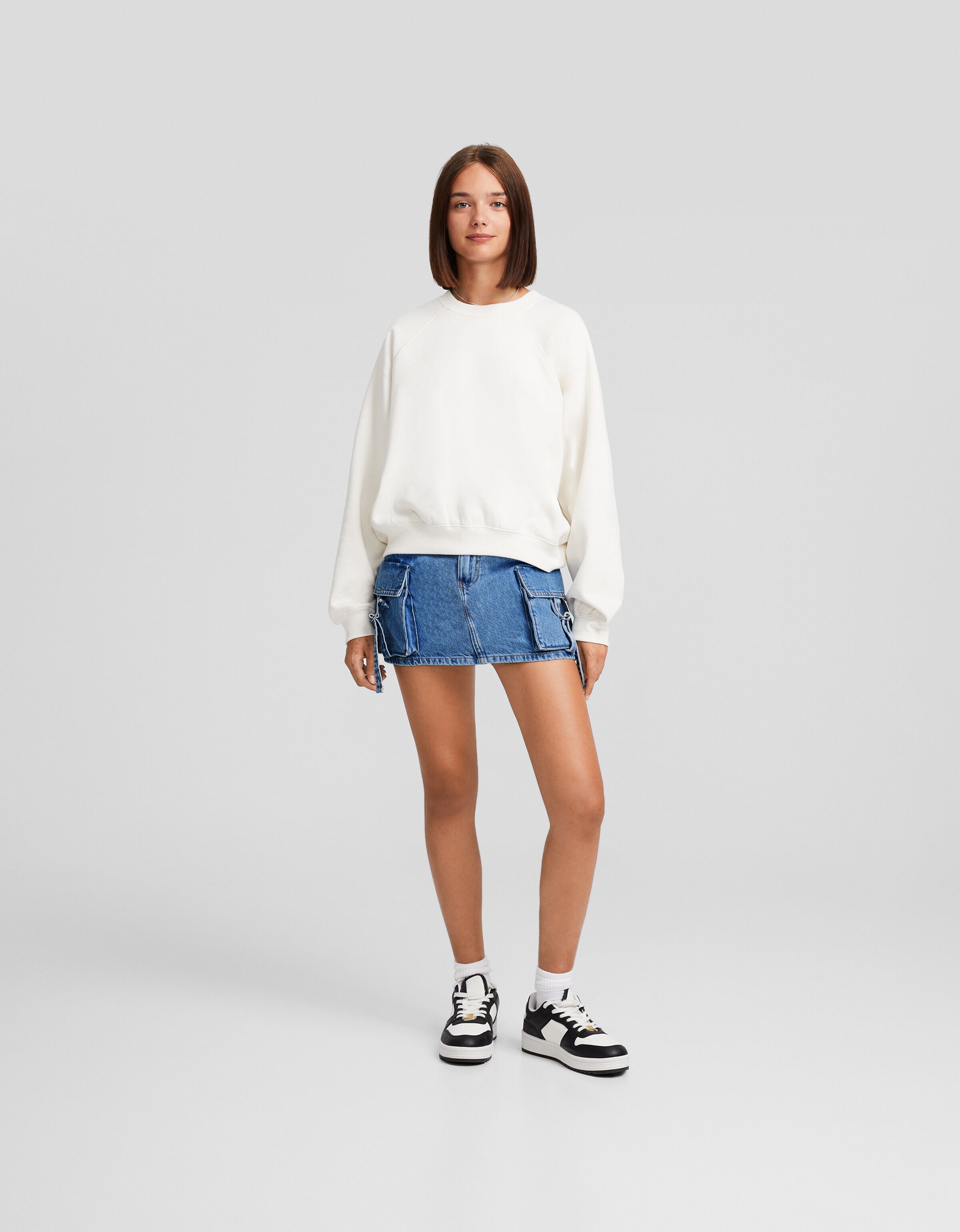 Falda denim mini cargo