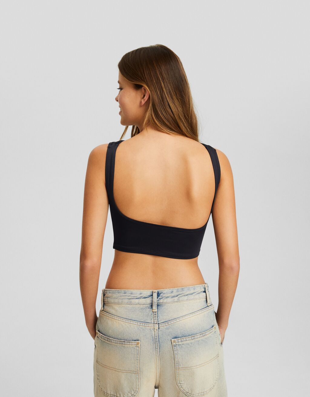 Camiseta sin mangas espalda descubierta