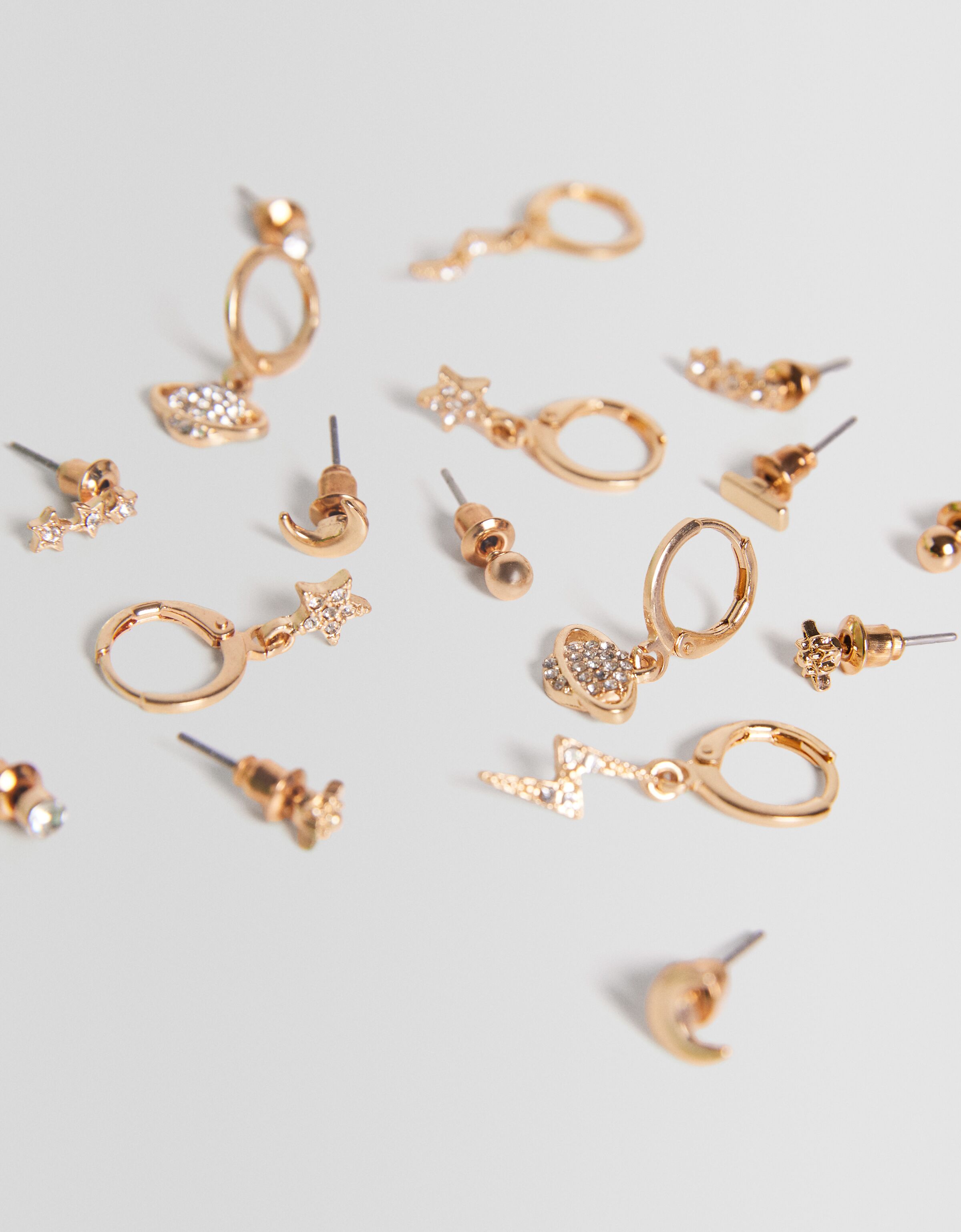 Set 9 pendientes estrella rayo planeta pedrería