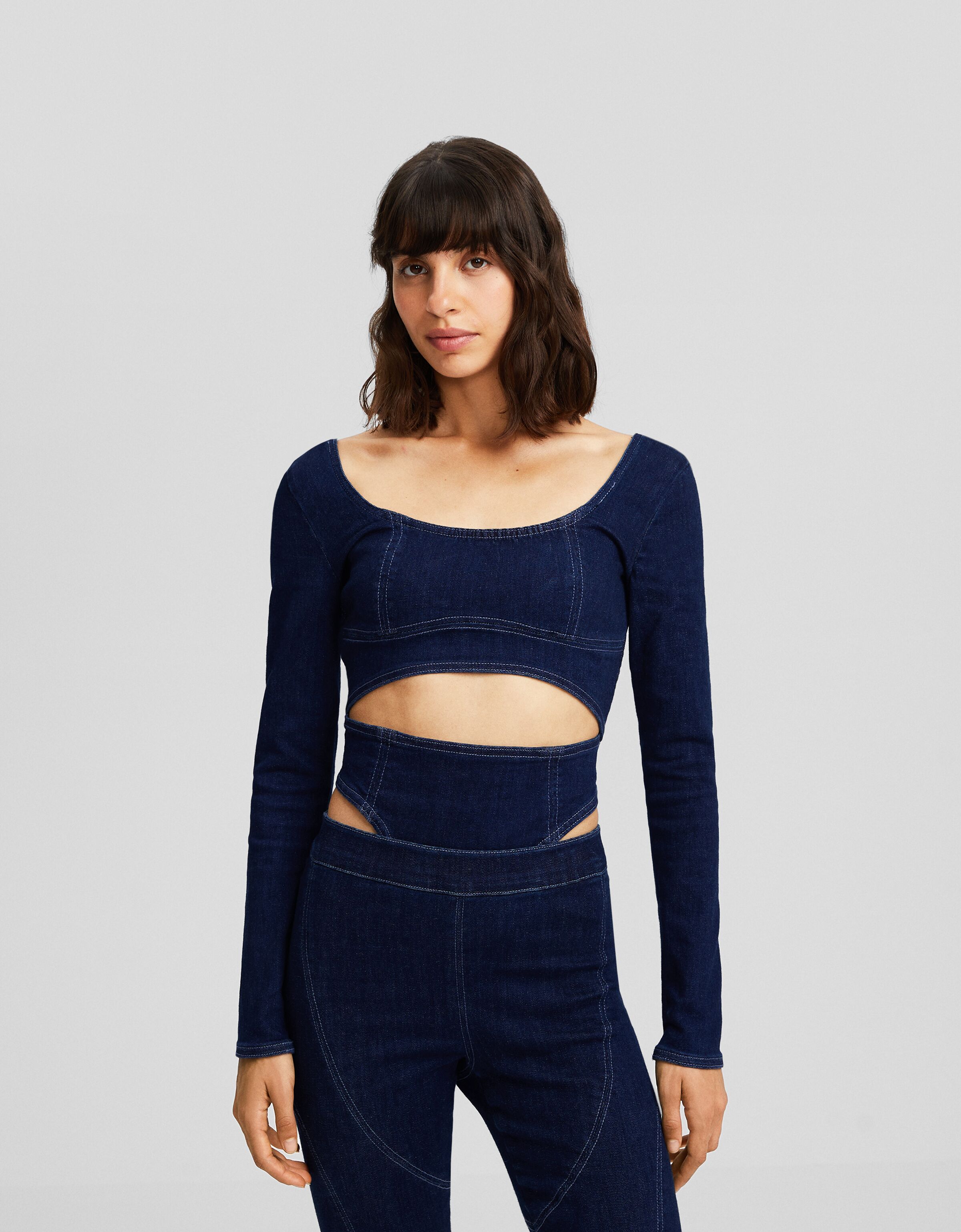 Body denim bodycon manga larga cut out