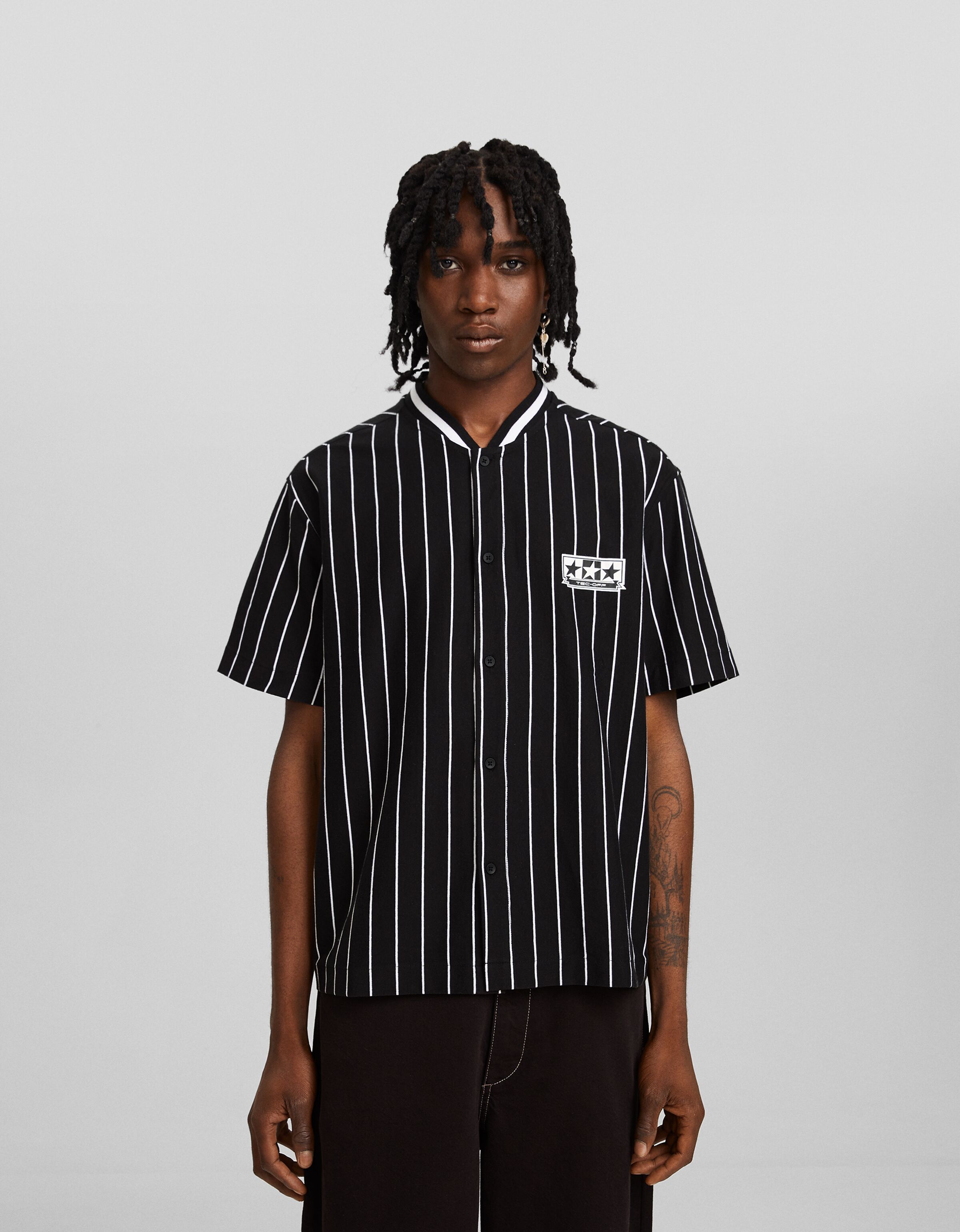 Camisa manga corta beisbolera