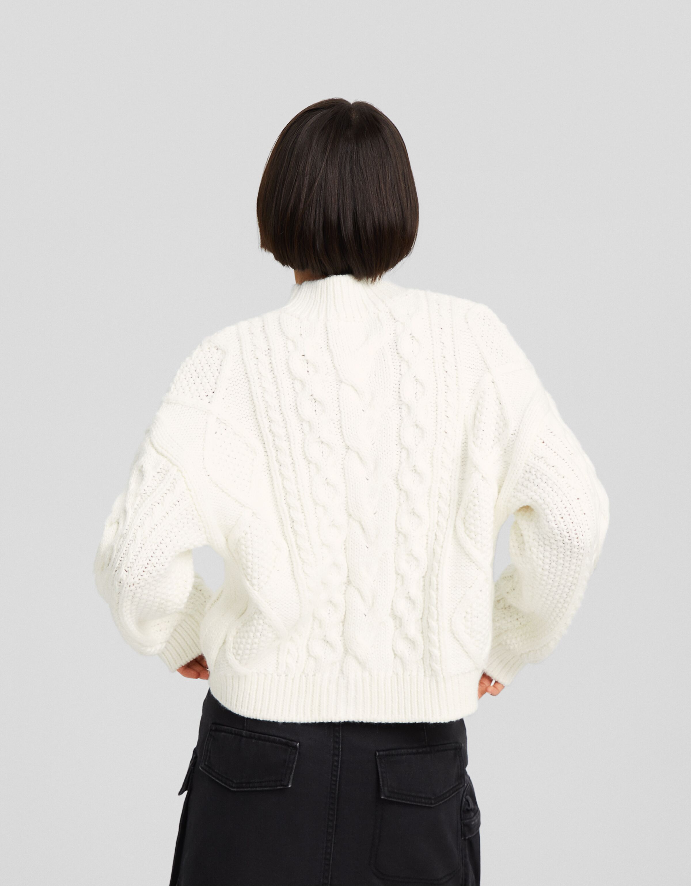 Jersey cuello subido trenzas