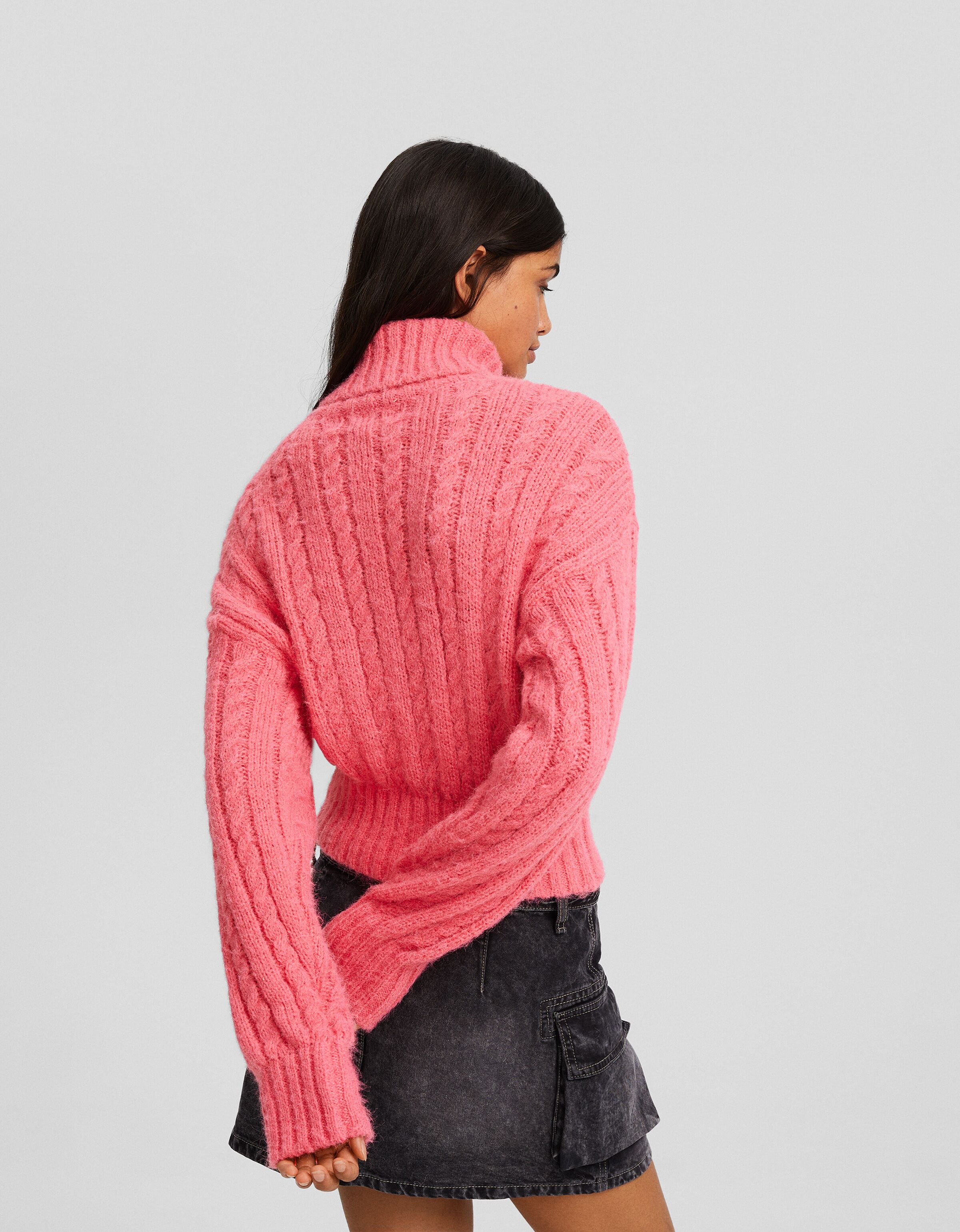 Jersey cuello subido trenzas