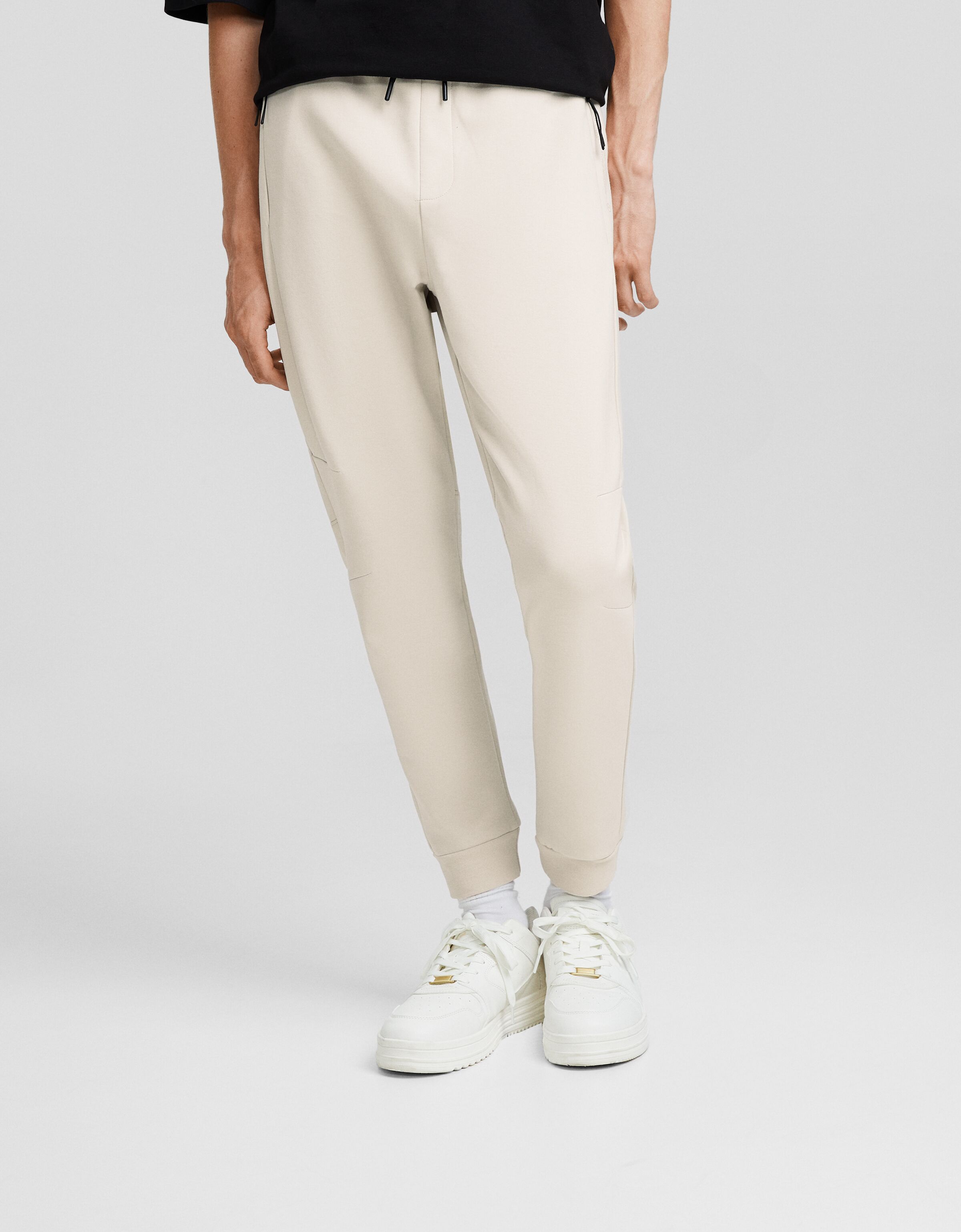 Pantalón jogger felpa cortes