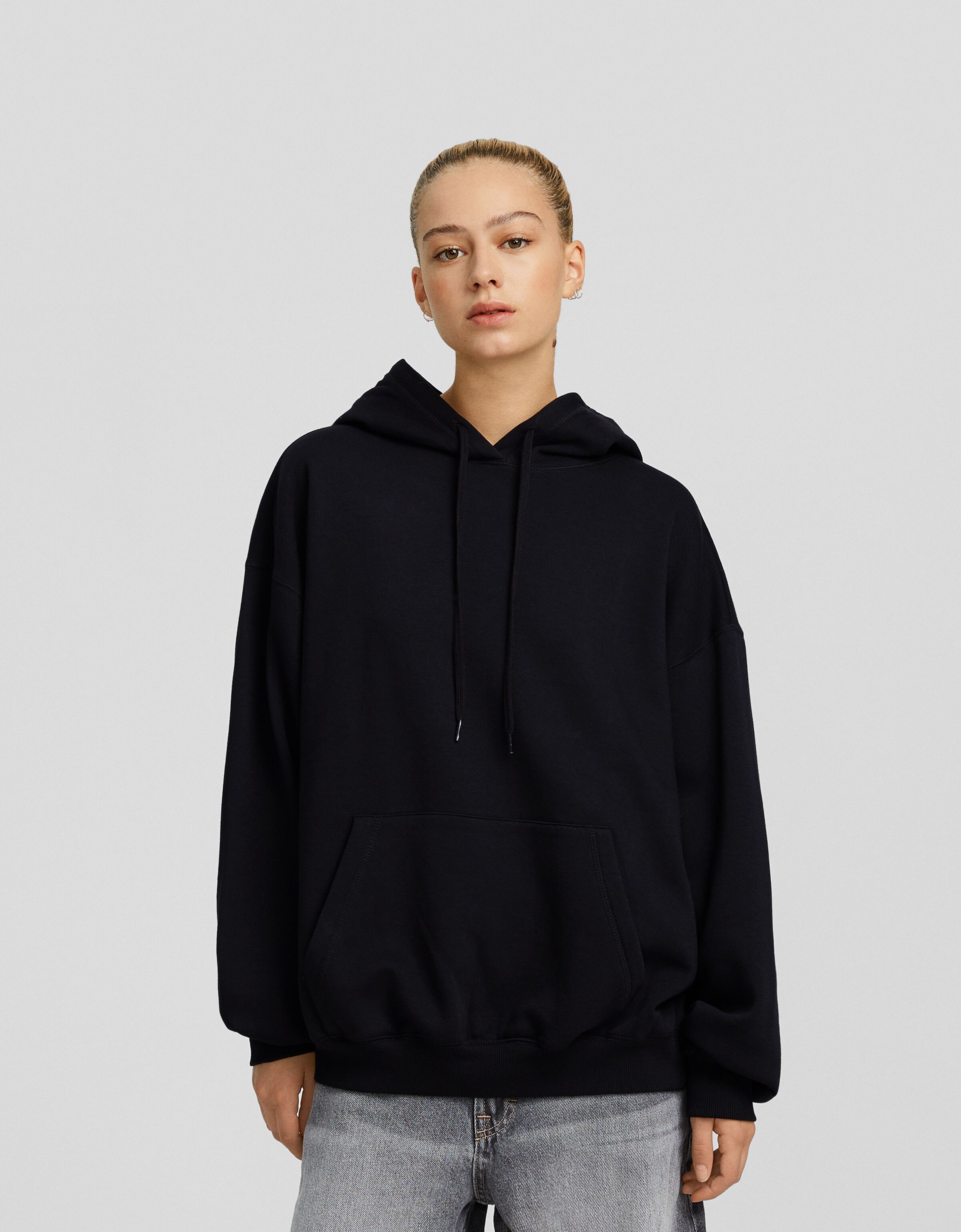 Sudadera capucha oversize bolsillo