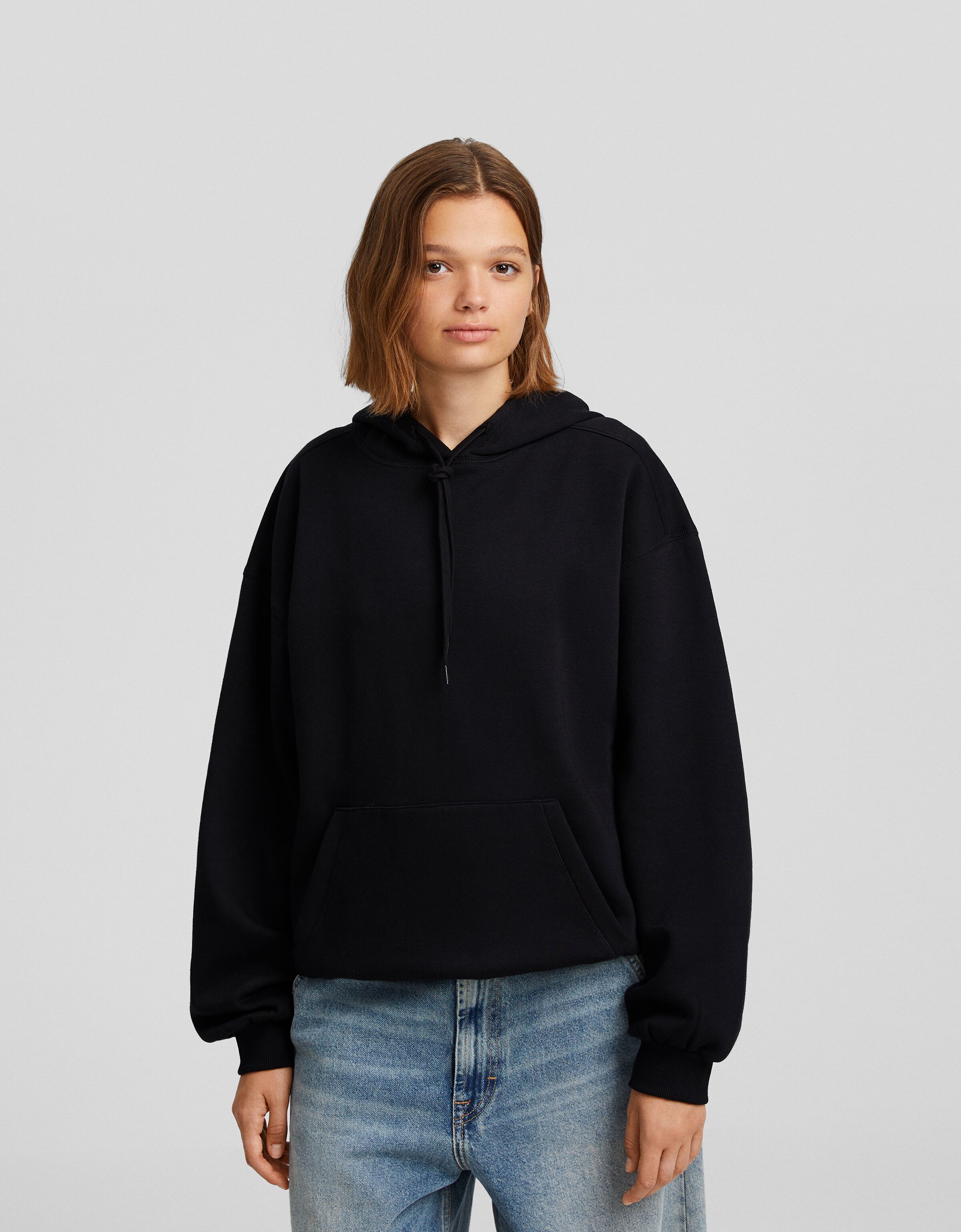 Sudadera capucha oversize bolsillo