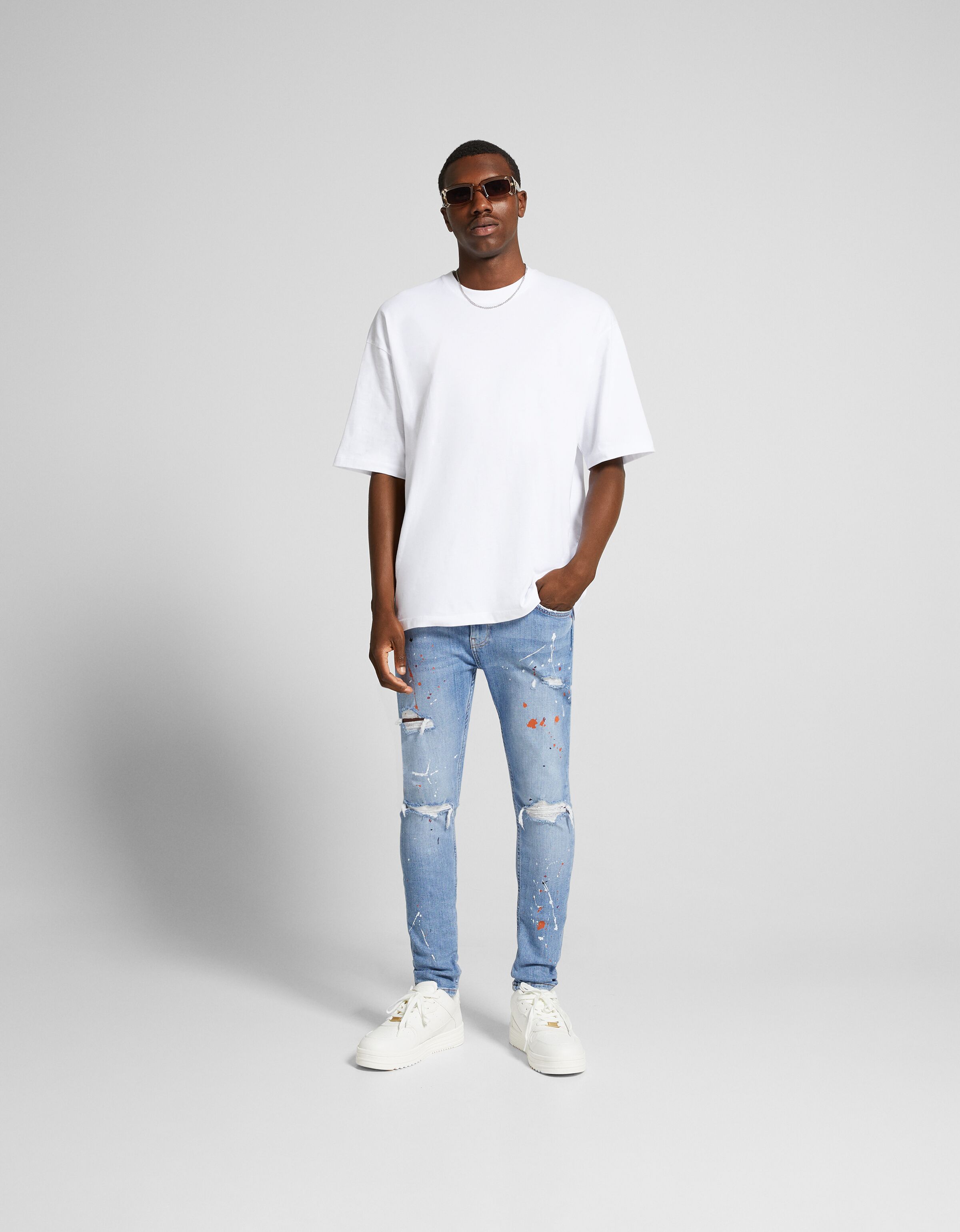 Jeans super skinny rotos pintura