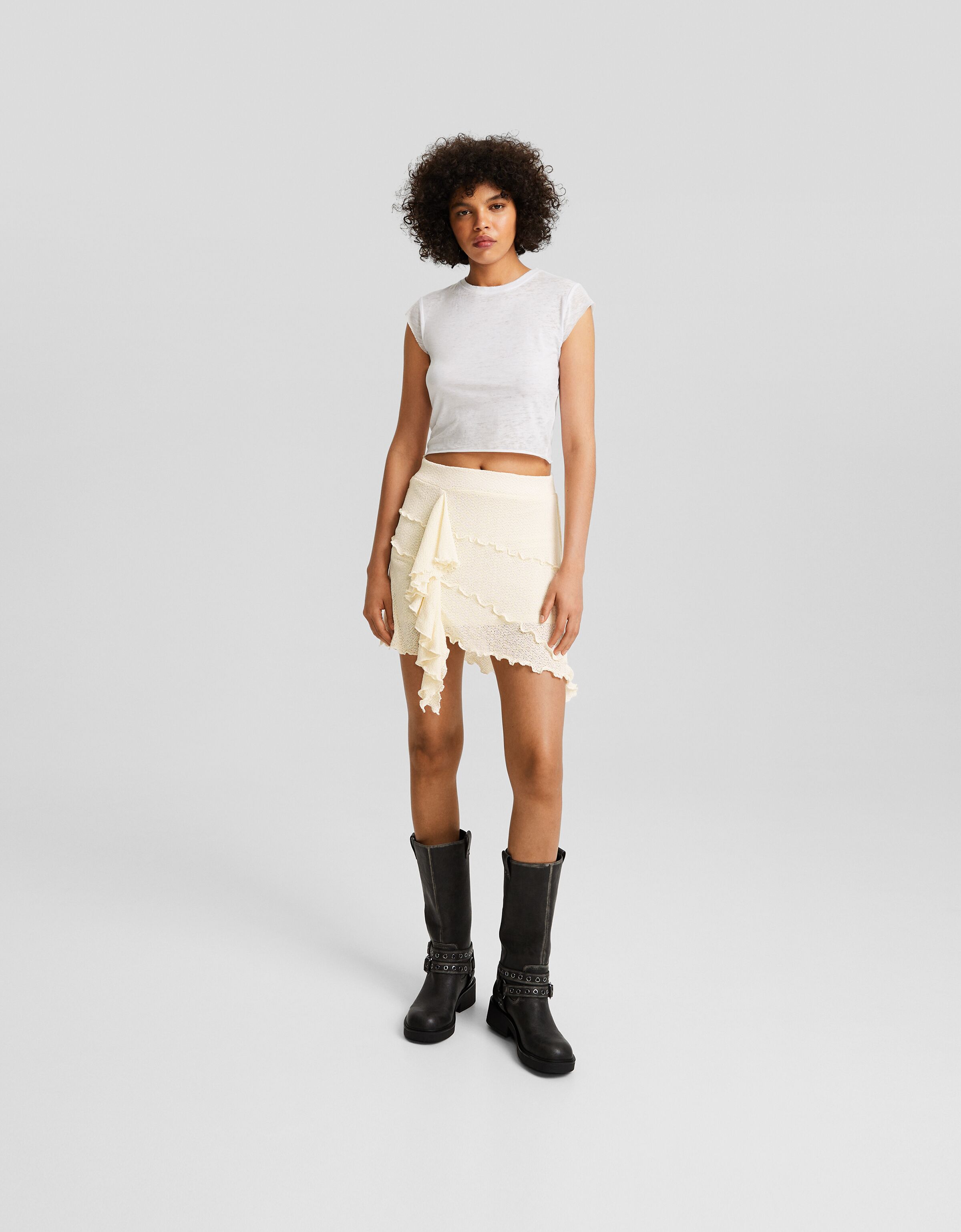 Falda mini punto asimétrica