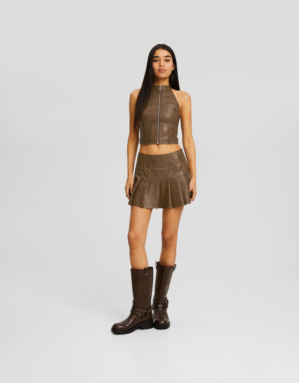 Falda mini efecto piel tablas