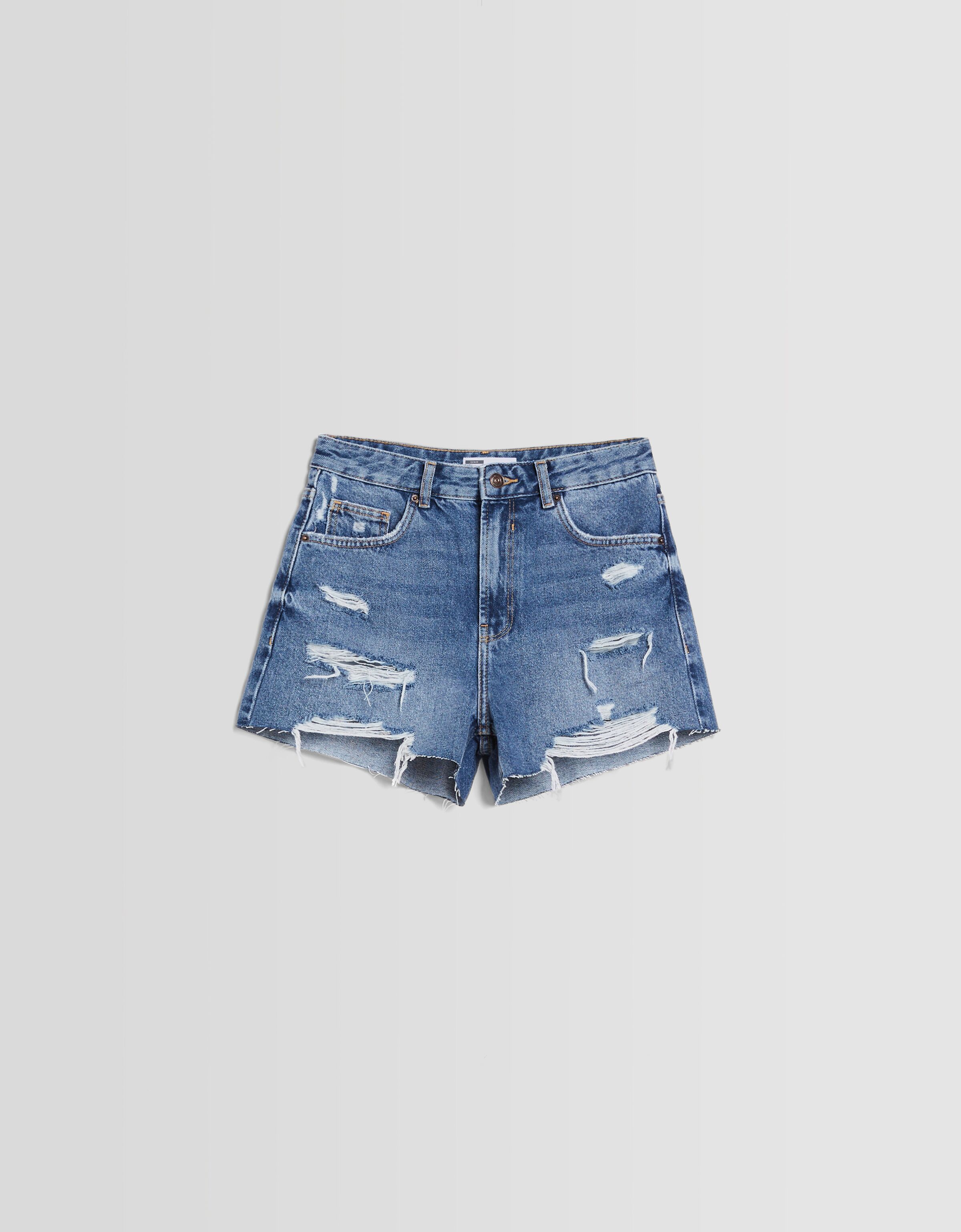 Short denim rotos bolsillos