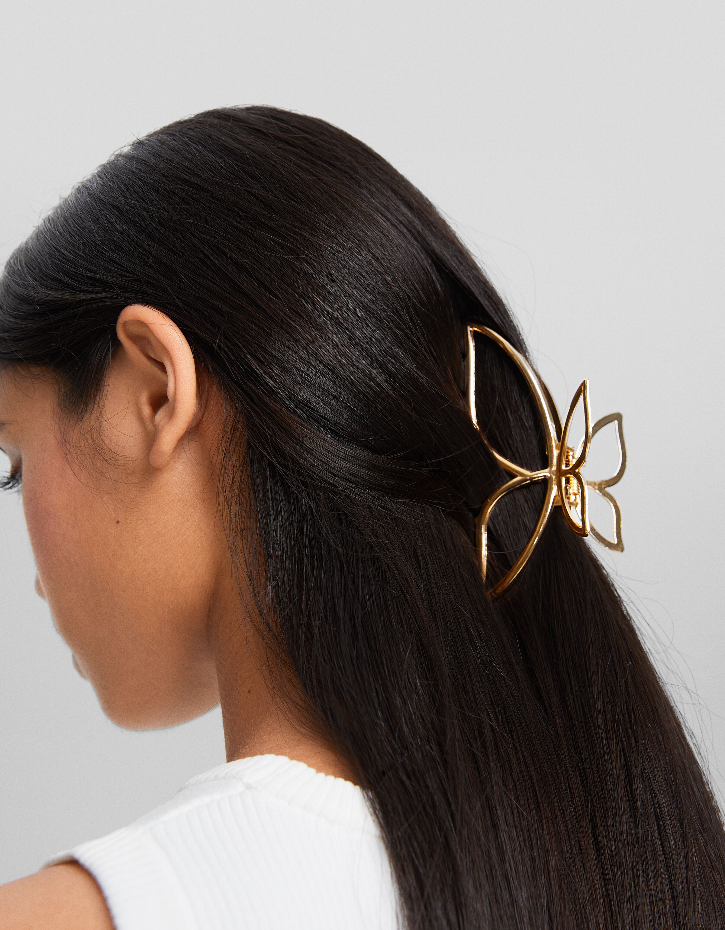 Pinza metálica mariposa