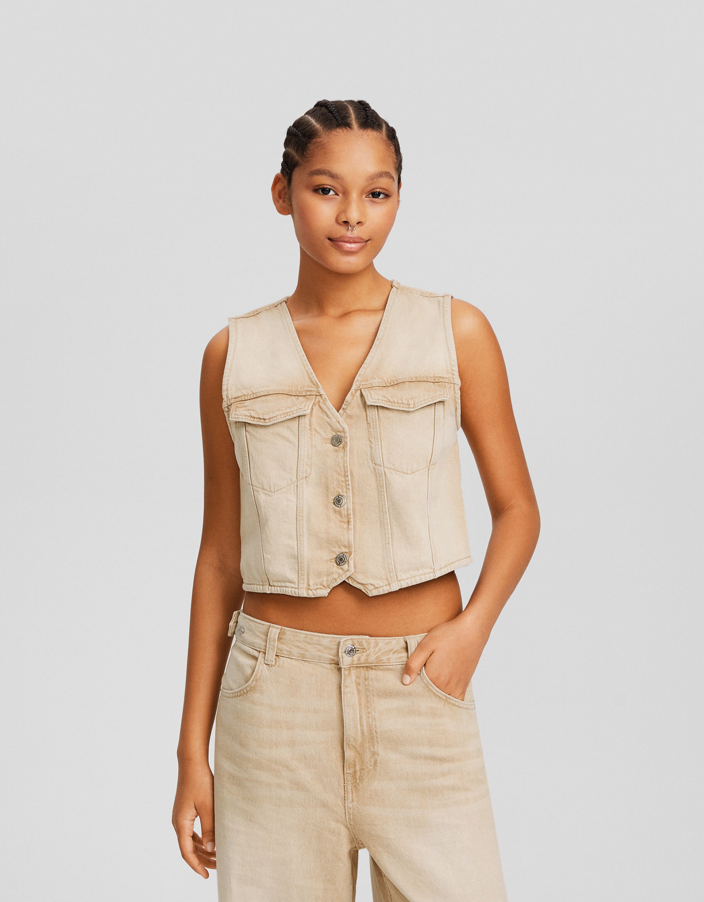 Chaleco denim botones