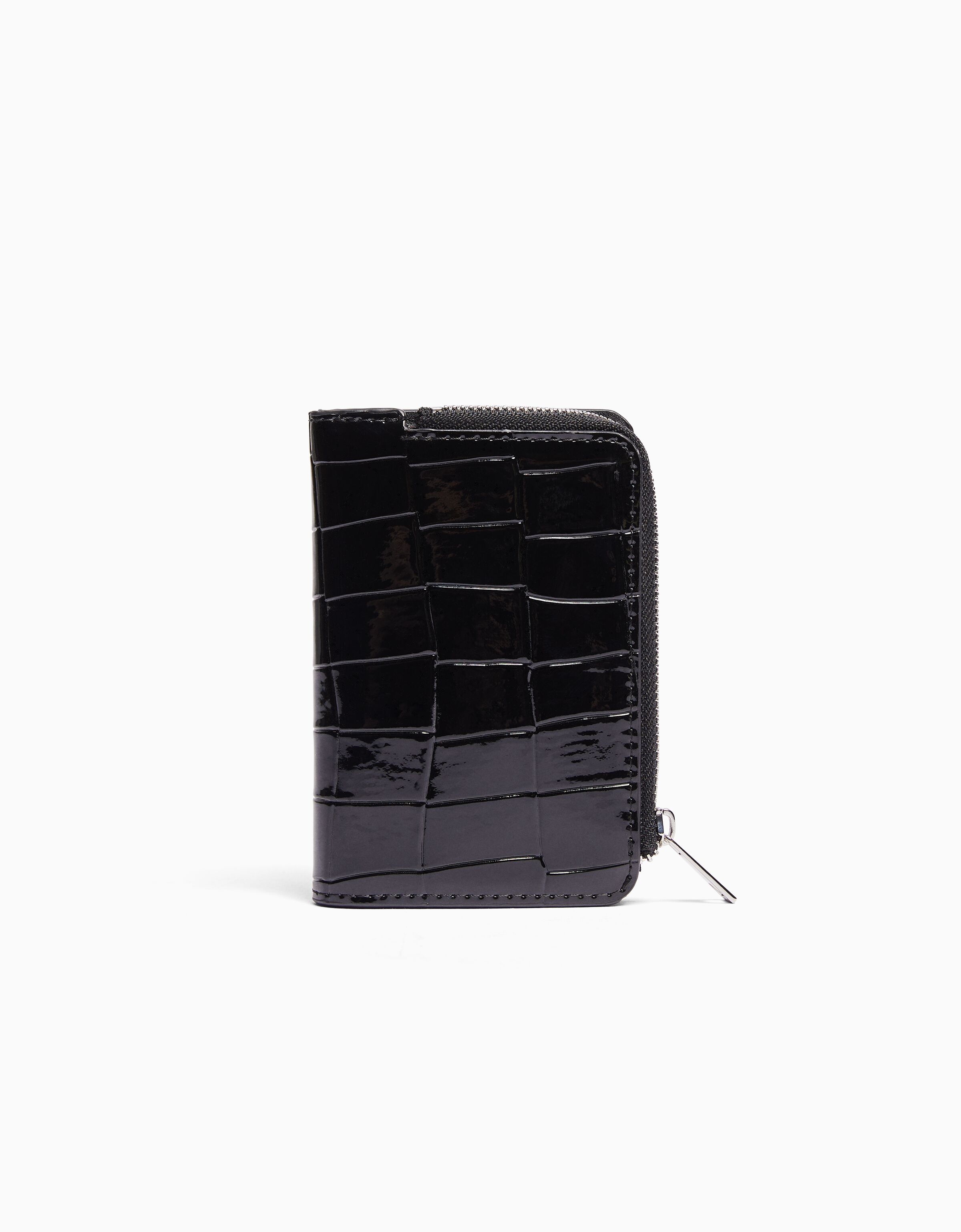 Monedero efecto charol grabado estampado animal