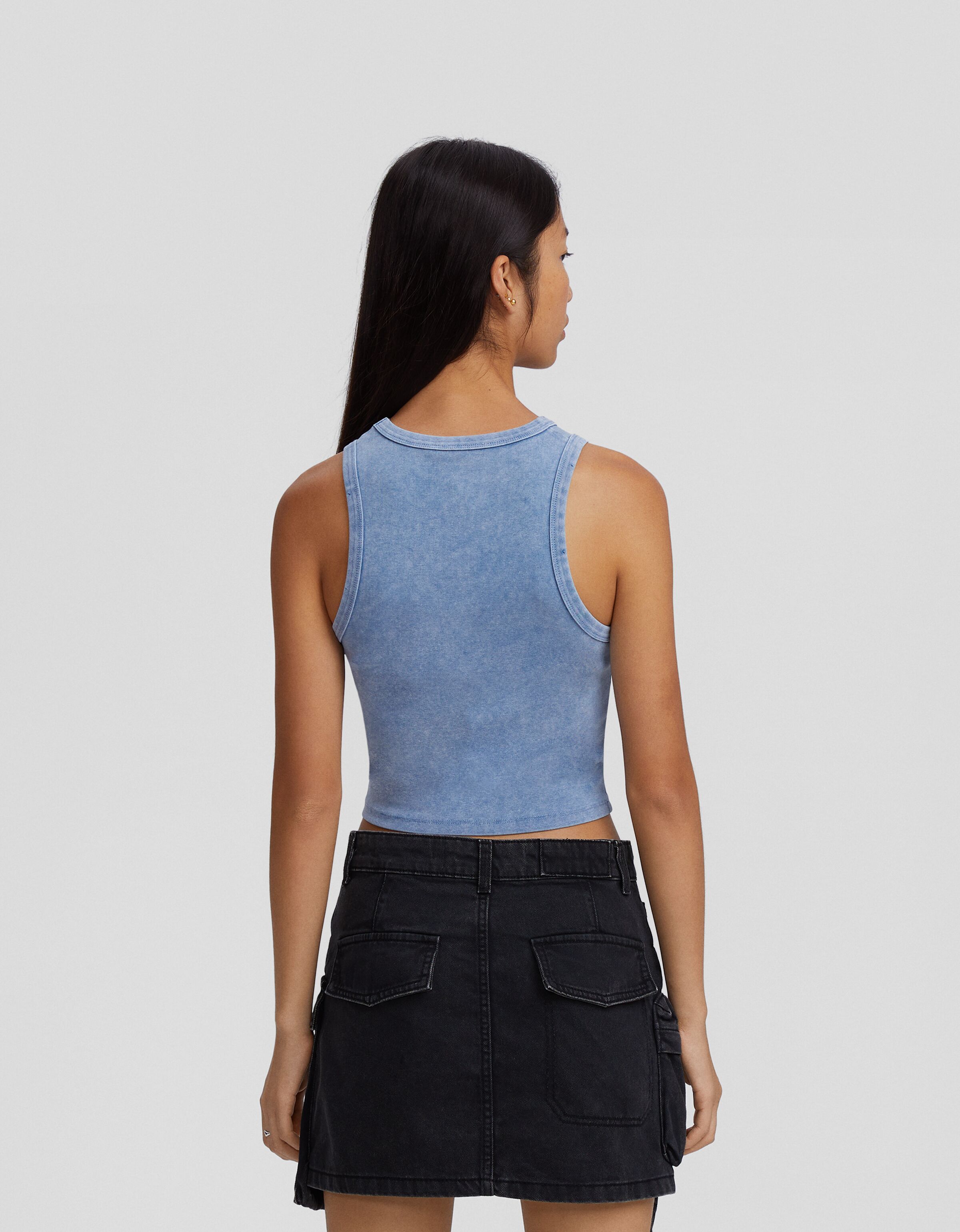 Camiseta sin mangas efecto lavado rotos