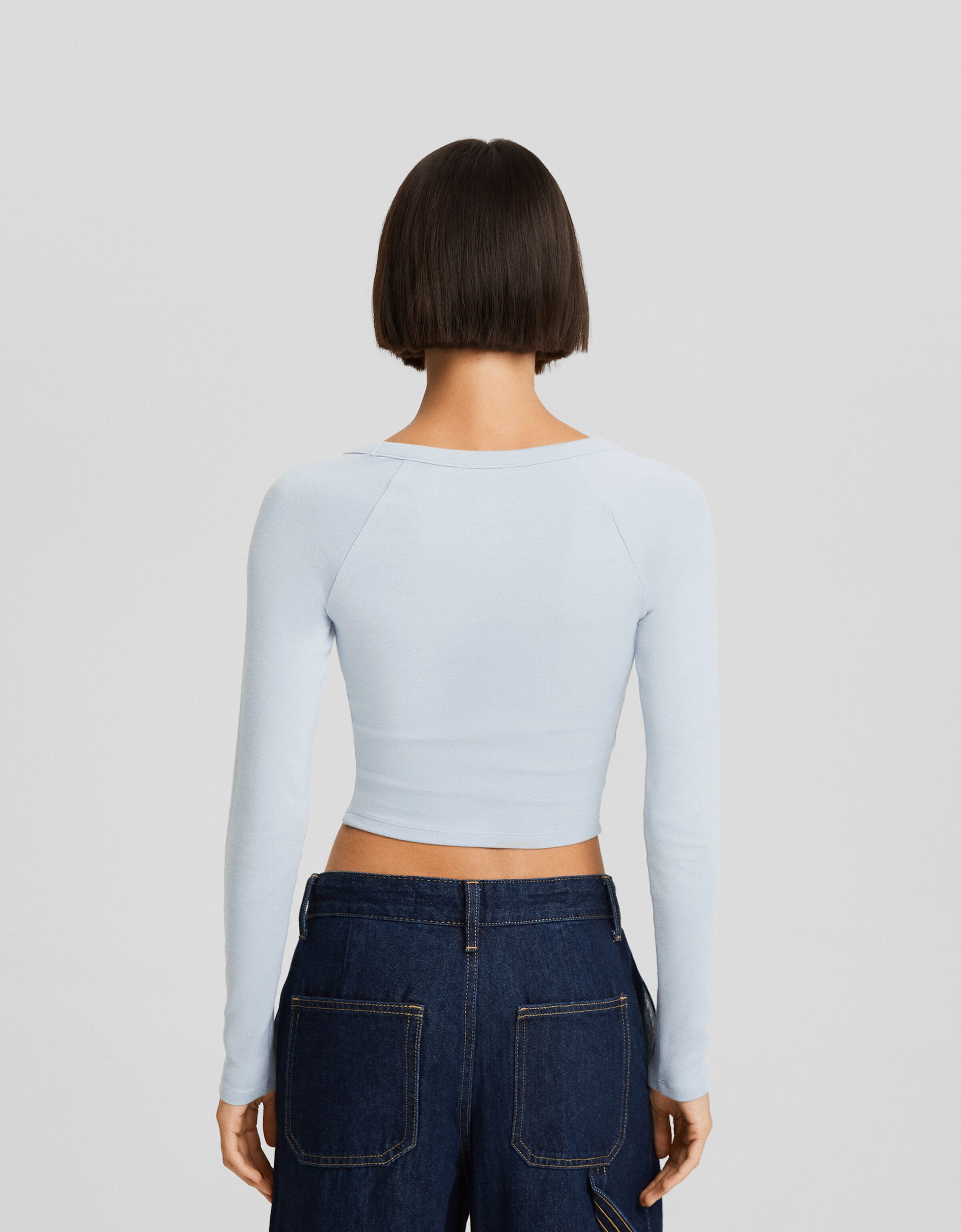 Camiseta manga larga cuello pico